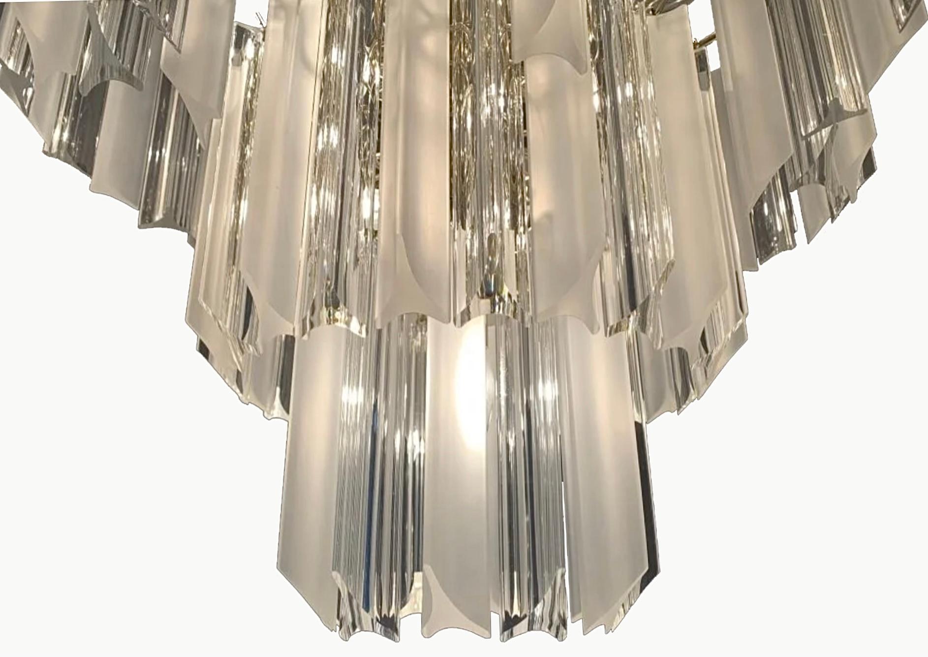 1960's in the style of Charles Hollis Jones. Fashioned in the shape of a wedding cake or waterfall. Clear lucite 