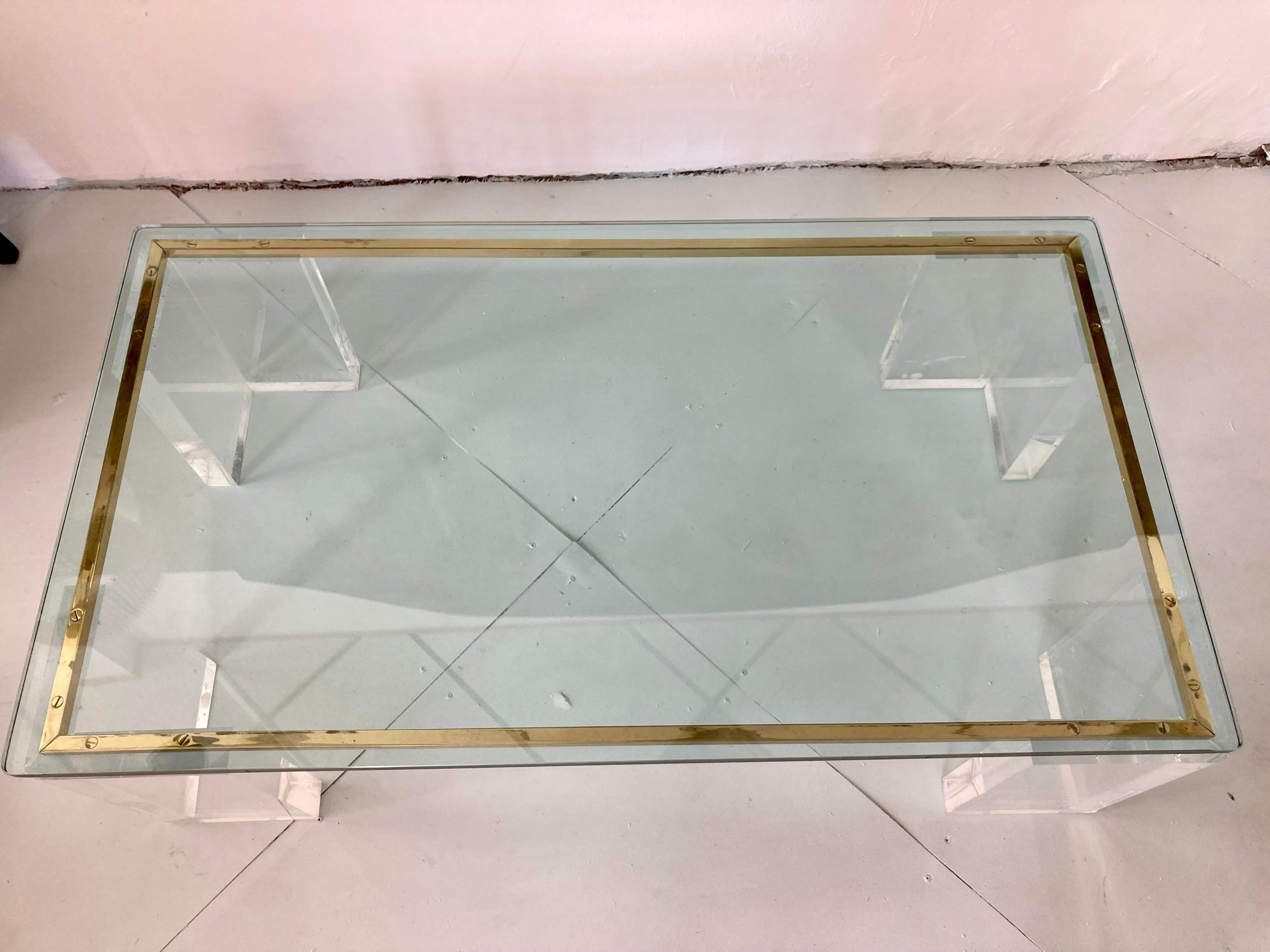 American Charles Hollis Jones Style Lucite Coffee Table With Brass Details For Sale