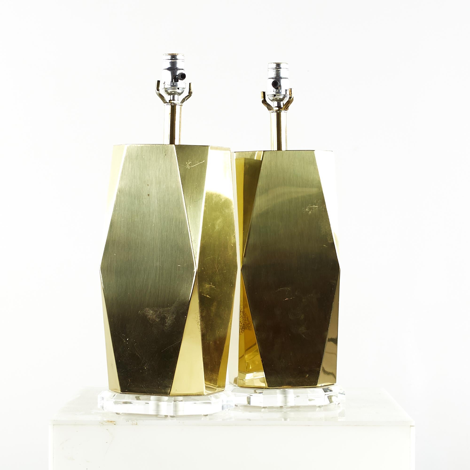 Charles Hollis Jones Style midcentury Brass and lucite Table Lamps - Pair
Each lamp measures: 6 wide x 6 deep x 20.5 inches high
We take our photos in a controlled lighting studio to show as much detail as possible. We do not Photoshop out