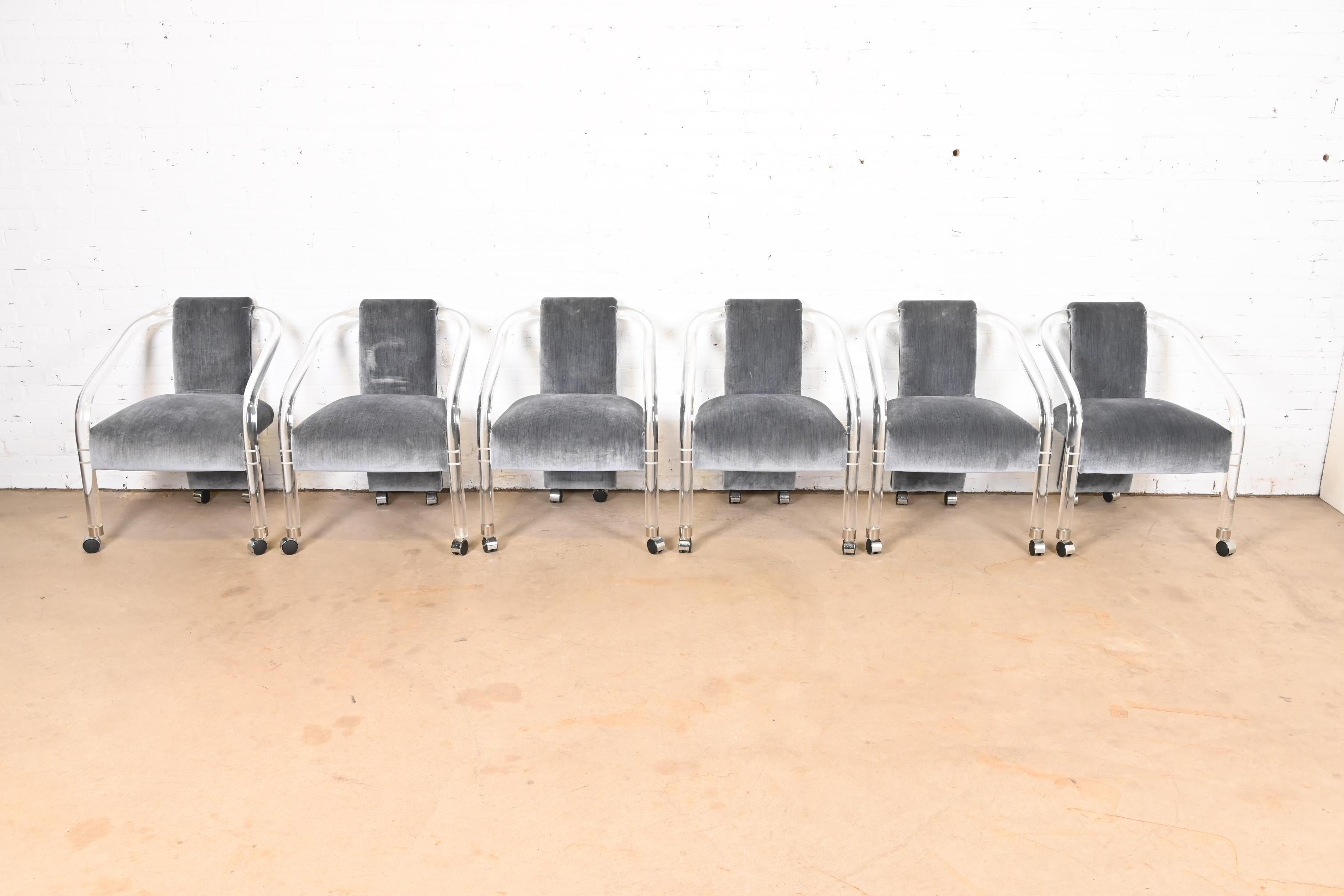 A gorgeous set of six Modern Art Deco or Mid-Century Modern lucite dining armchairs, club chairs, or lounge chairs

In the manner of Charles Hollis Jones

By Hill Manufacturing Co.

USA, Circa 1970s

Sculptural lucite frames on casters, with gray