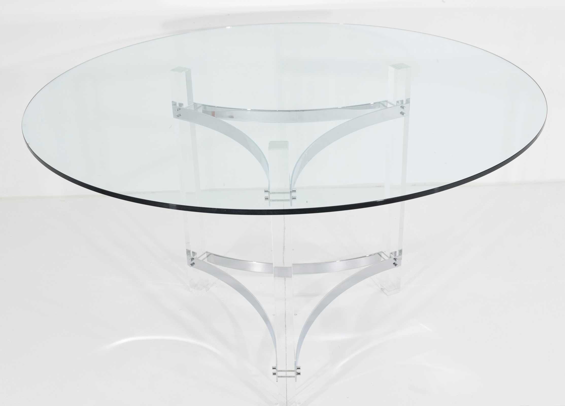 We have two of these table bases that can be used to support a single glass top or used individually to support a round tabletop. Chrome and Lucite are clean and very nice. Glass not included but we can have made in any size desired. Bases are