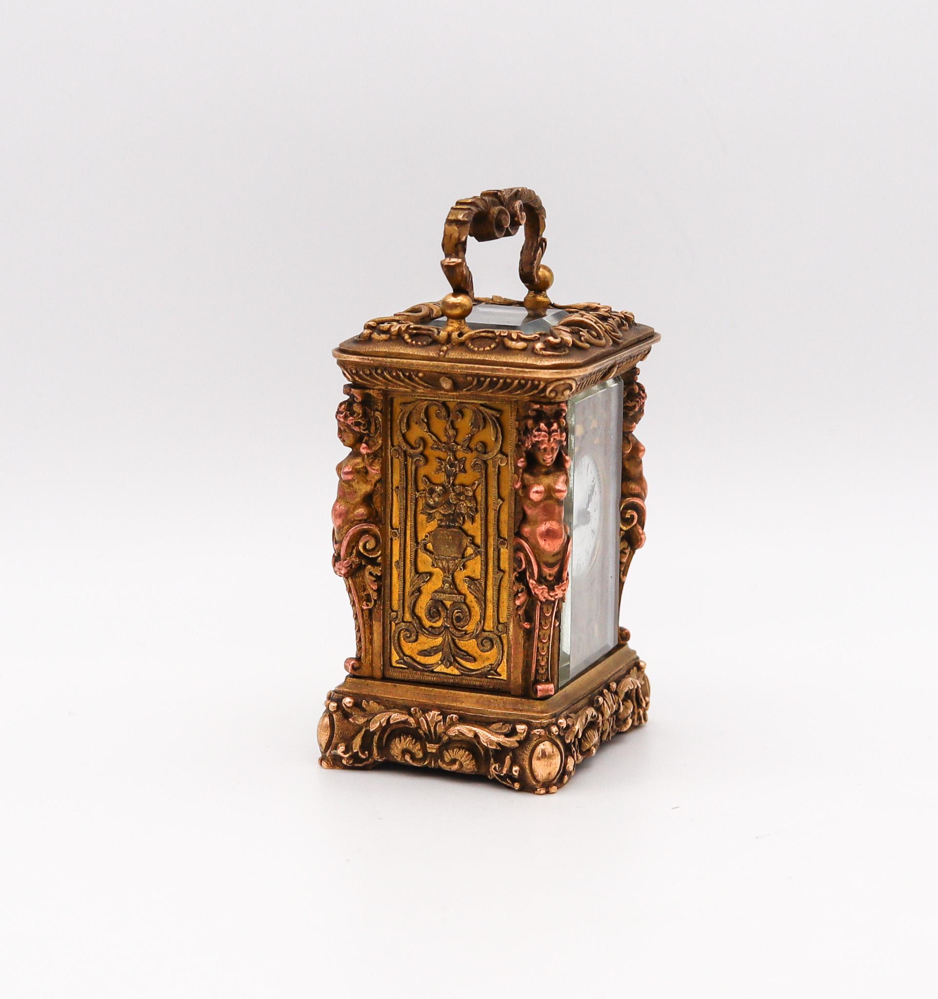 French miniature travel clock designed by Charles Hour

Beautiful miniature carriage travel clock, created in Paris France by the horologist Charles Hour for William Ward & Sons company. Crafted in the baroque style in solid bronze ormolu with three