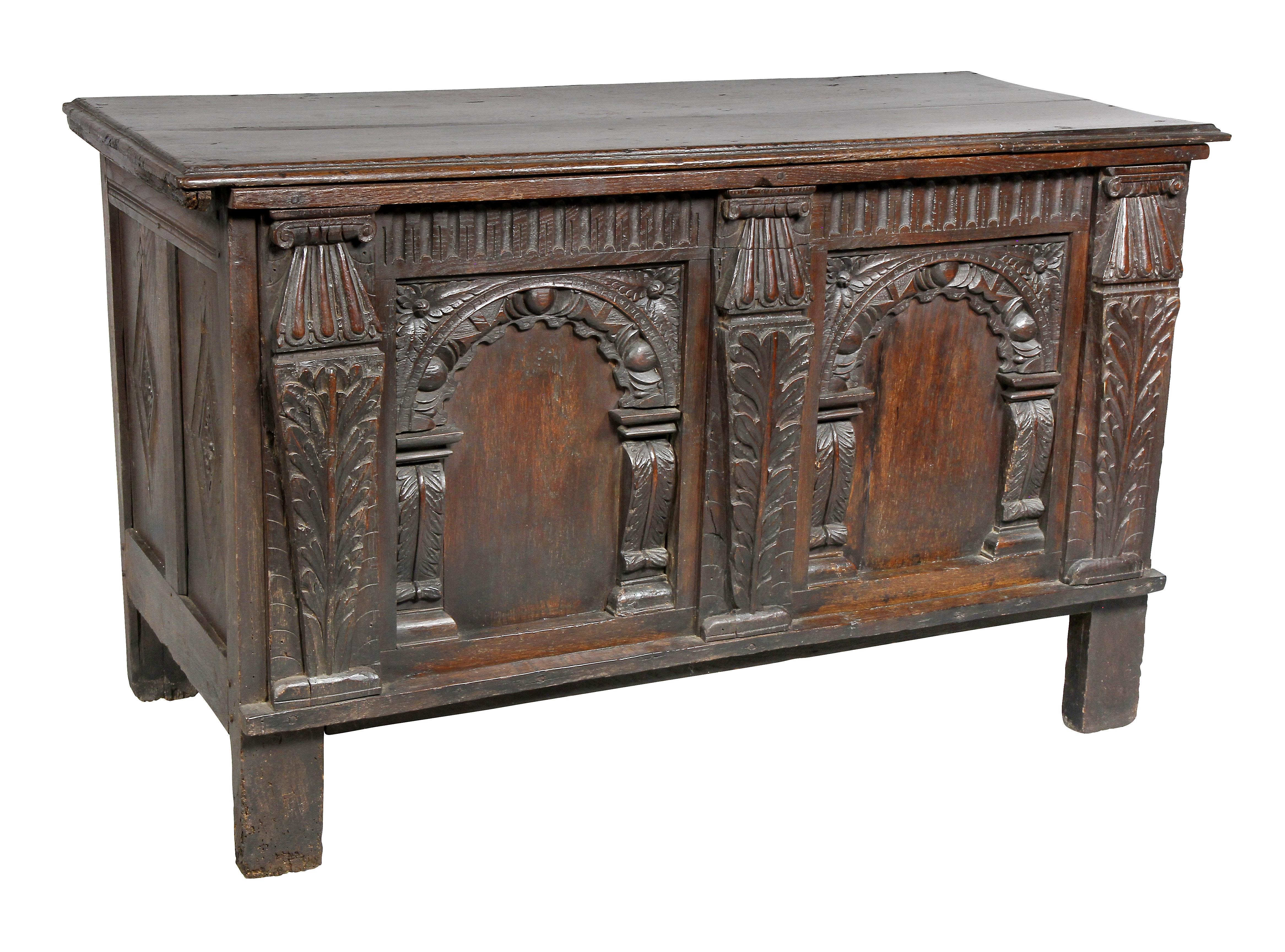 A good example with a hinged board top and case with fluting over two arcaded panels with carved columns in between, panelled sides, board feet. Provenance; Sears Estate.