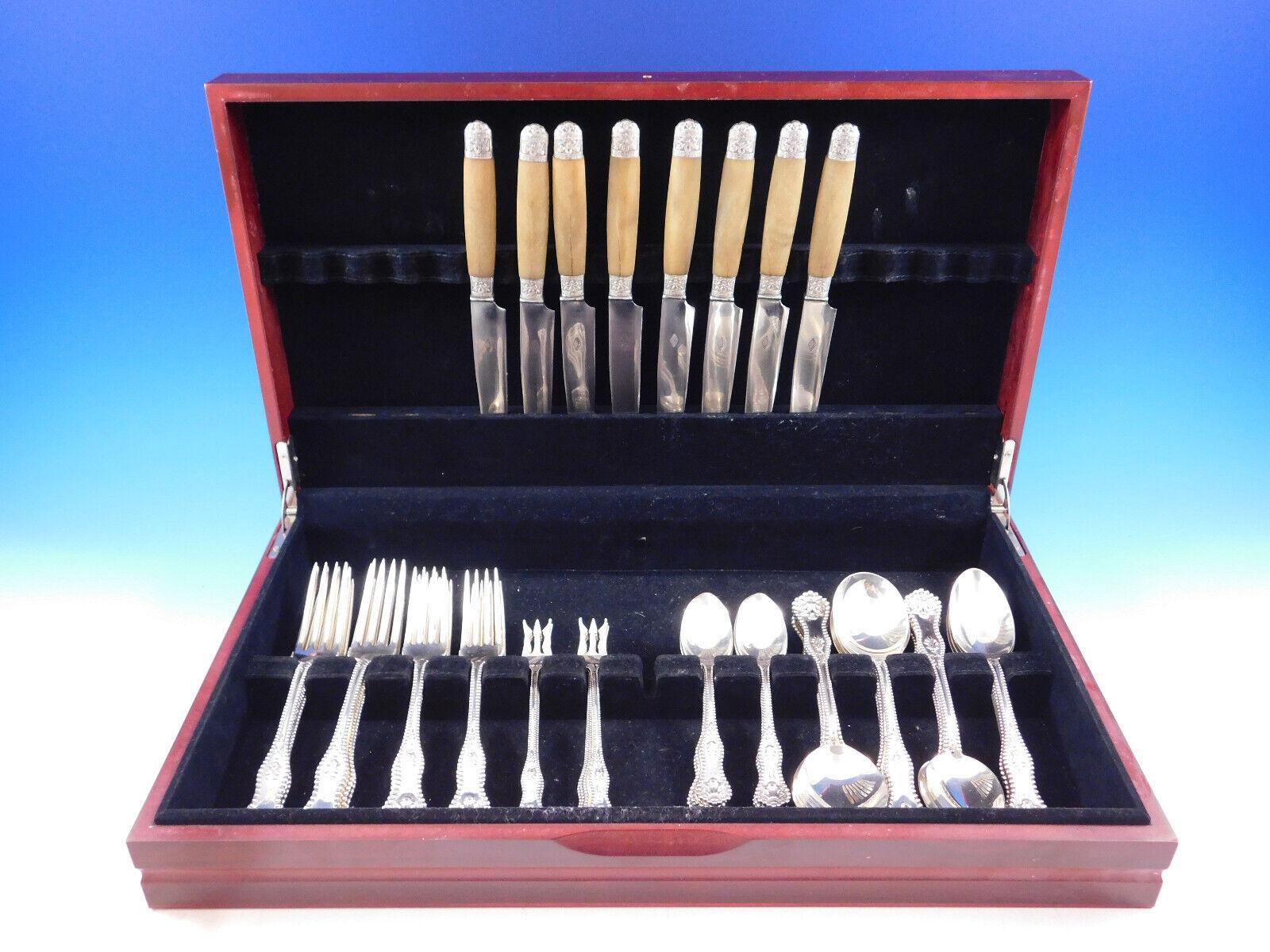 Rare Charles II by Dominick and Haff sterling silver Flatware set - 56 pieces, including 8 horn handle dinner knives. This pattern was introduced in the year 1894 and features a stunning beaded border and shell motif. This set includes:
 
8 dinner