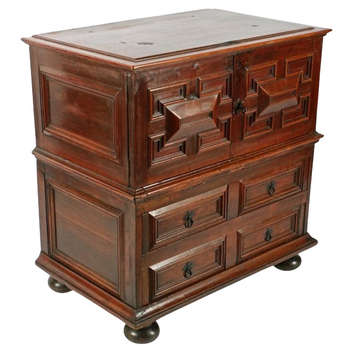 Charles II Cedar Wood chest

A 17th century Charles II cedar wood cushion fronted chest.

The chest is smaller than usual and comes in two parts, the two door cupboard top has been converted from a hinged lid top.

The chest has a cushion