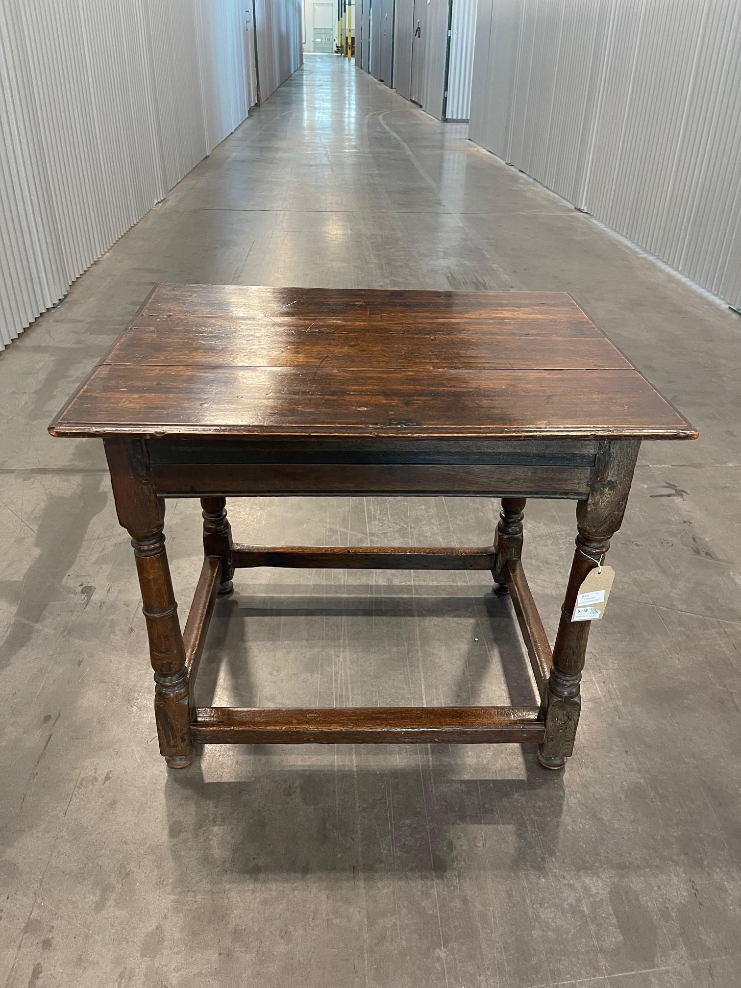 A wonderful Charles II early country oak stretcher table Circa 1680, pegged and molded rectangular three plank top, the rails with sunken fillet moldings', all on turned supports with a ring and united by plain pegged stretchers. The  oak coloring
