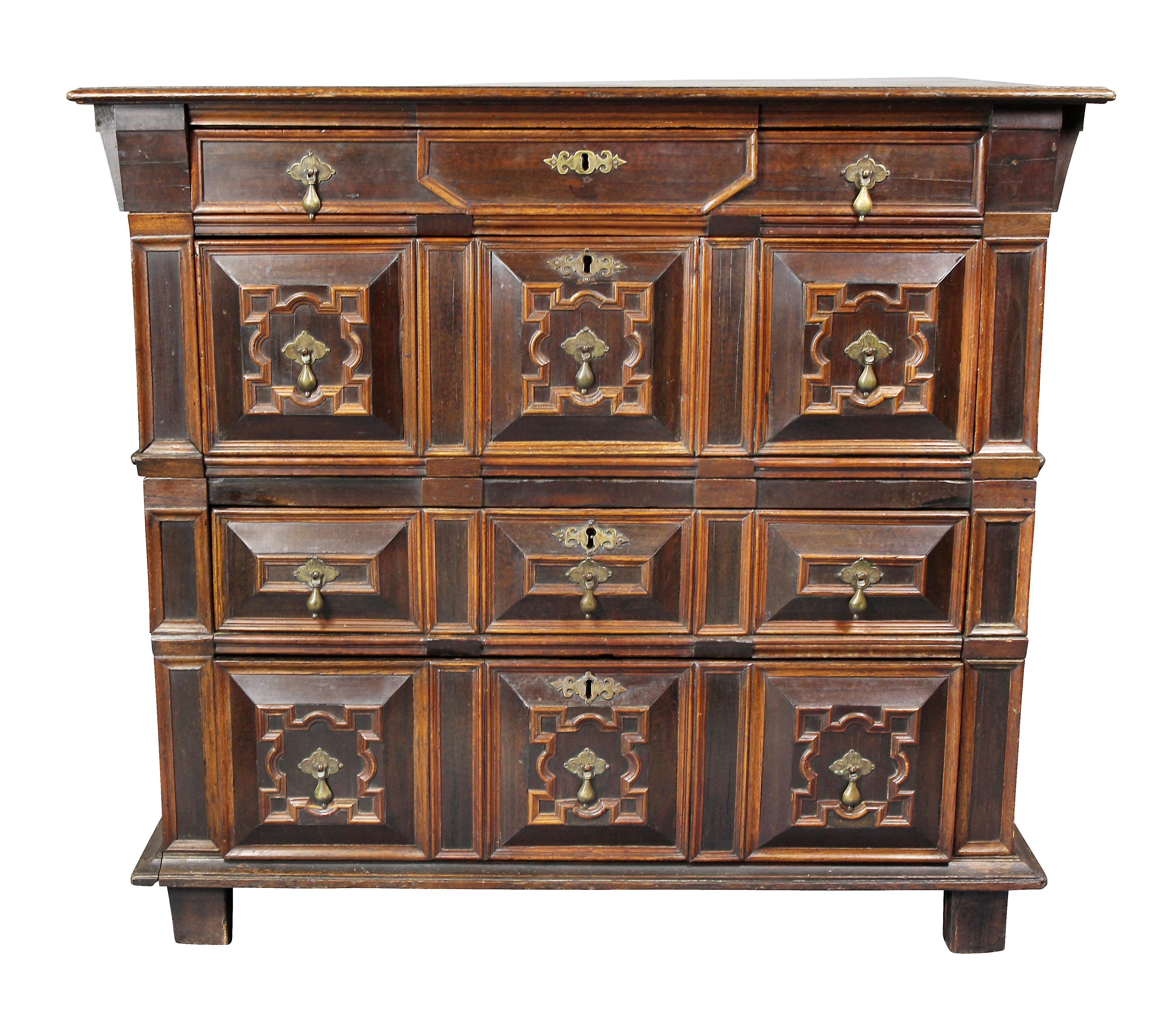 In two parts, rectangular top over a thin drawer and panelled deep drawer, lower section with two panelled drawers, stile feet. Provenance; Sothebys, Vernay & Jussel.