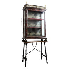 Charles III style ebonized wood display case with bronze mounts and polychrome