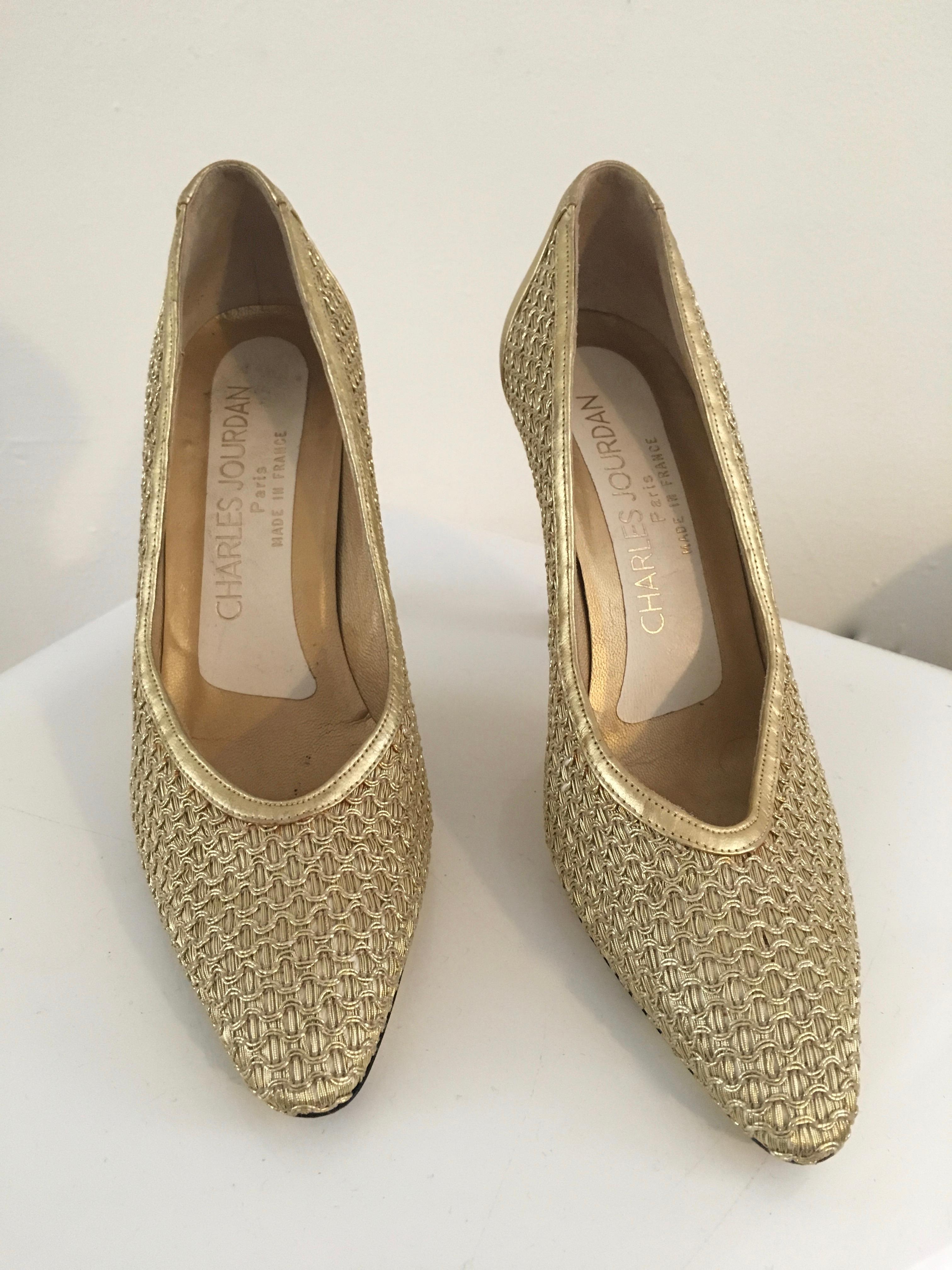 Charles Jourdan 1980s gold volupte sultane pumps are size 7M. 
Made in France. 
Ladies these Charles Jourdan gold pumps will look amazing with your Chanel suit, Versace cocktail dress or your YSL tuxedo.  
In very good condition. 
Charles Jourdan