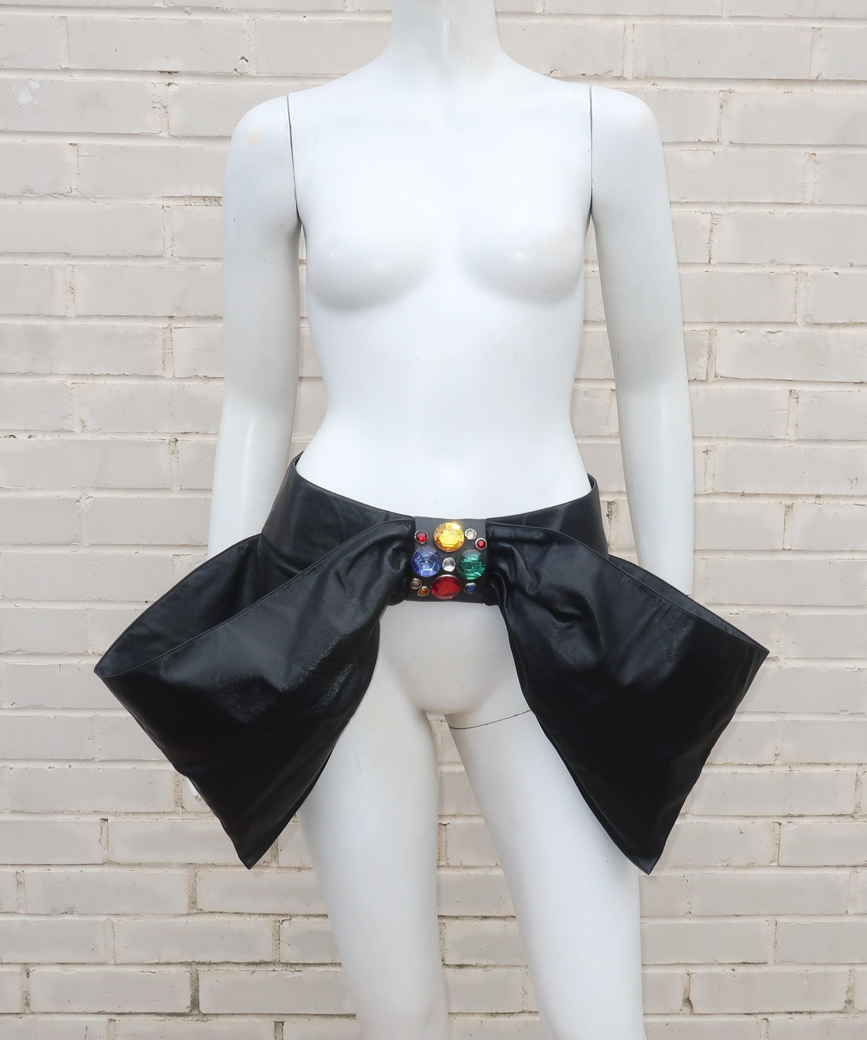 Tie your ensemble up with a big fabulous bejeweled black leather bow belt by Charles Jourdan.  Describing this piece as a belt may be an understatement as it commands attention both in size and detail.  It is designed to sit at the top of the hips