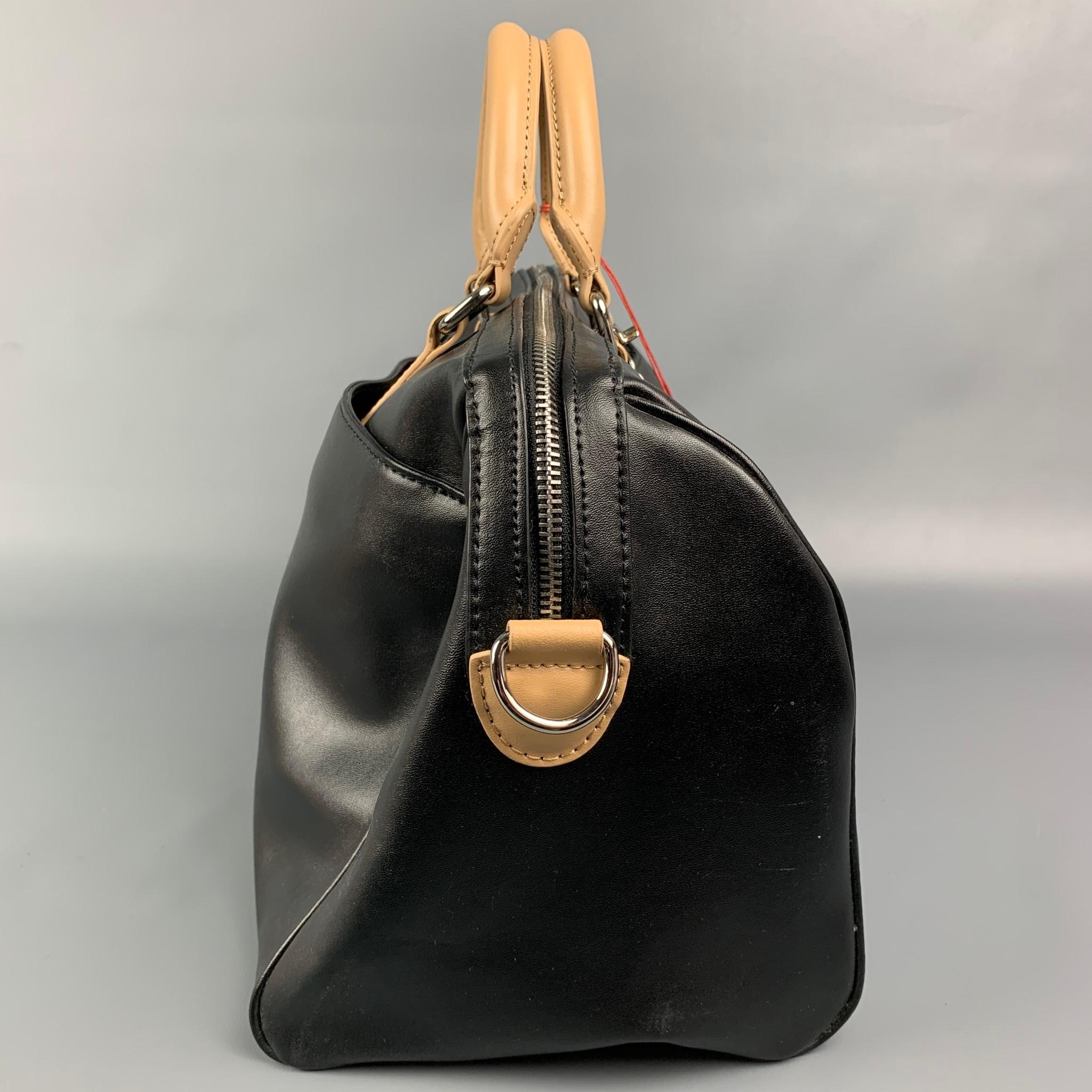 black and tan handbag
