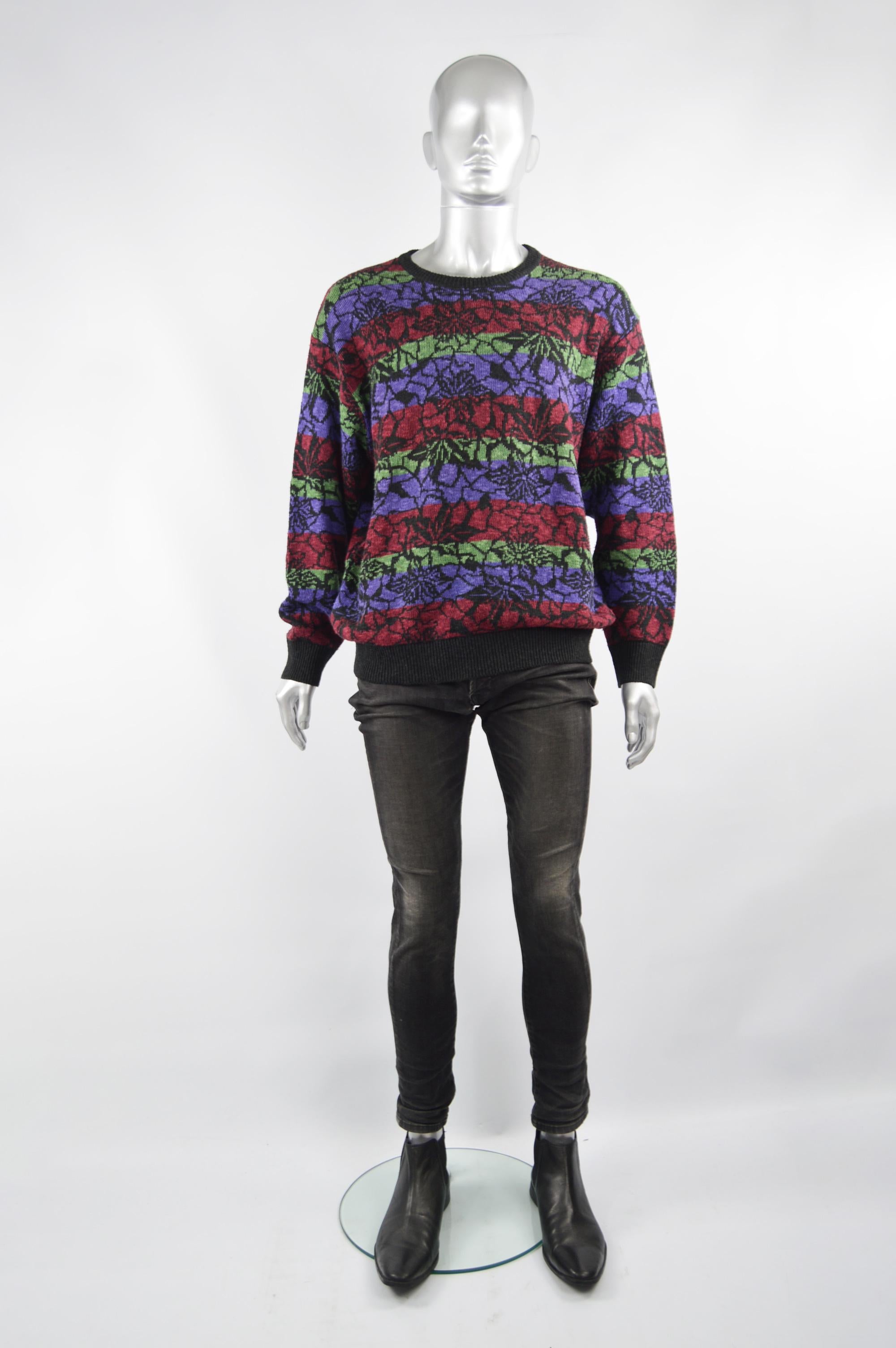 An amazing vintage men's sweater from the 80s by luxury French fashion house, Charles Jourdan. In a multicolored linen and cotton knit with a striped pattern and floral pattern over the top. 

Size: Marked XL but this gives an oversized, slouchy