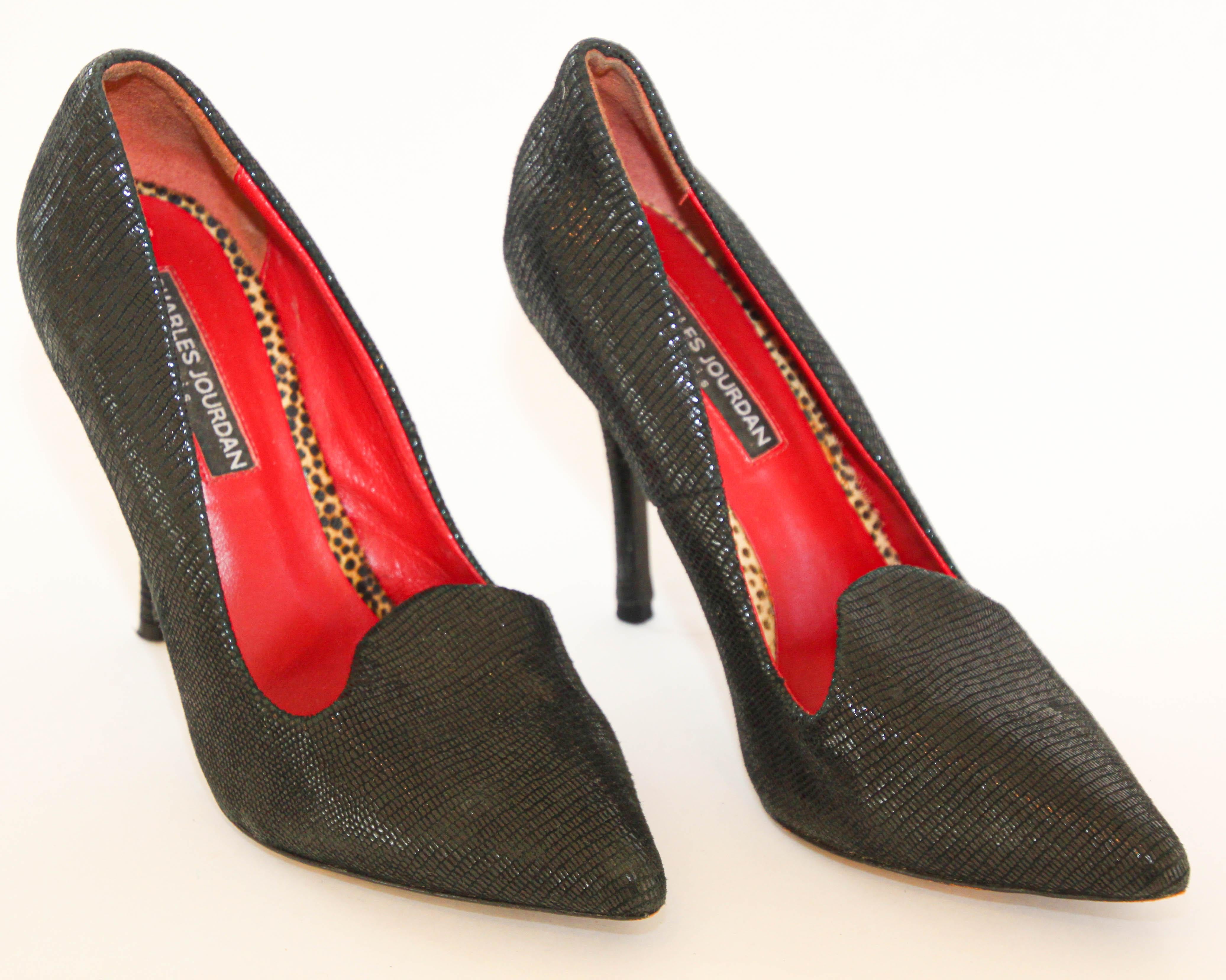 Charles Jourdan Paris Shoes Stiletto Heels Black Suede Snake Print 1990s.
Charles Jourdan Paris heels with red leather sole with leopard animal print accent inside.
French elegance, chic to wear everyday or for a party.
Size: Size 6 M.
Heel Height: