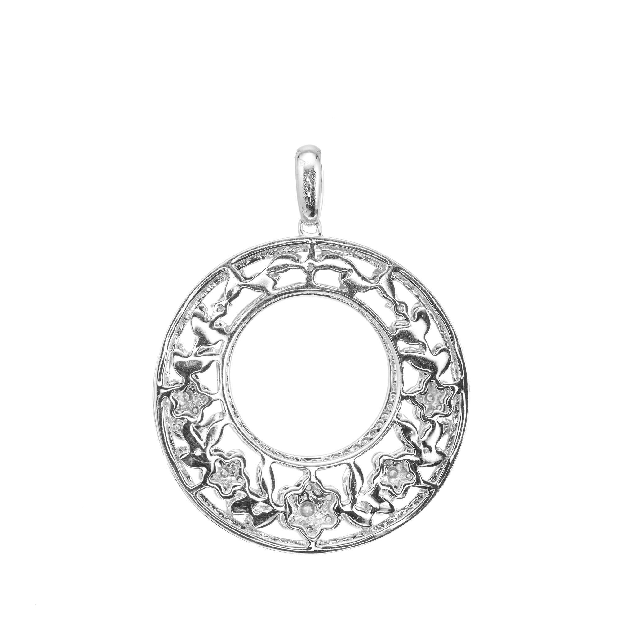 Charles Krypell white gold micro pave diamond wreath circle pendant. Set in 18k white gold with 1.20cts of round accent diamonds. 

Full cut diamonds, approx. total weight 1.20cts, F, VS
18k White Gold
Stamped: D 1.20 C Krypell 18k+
8.6 grams  
5 x