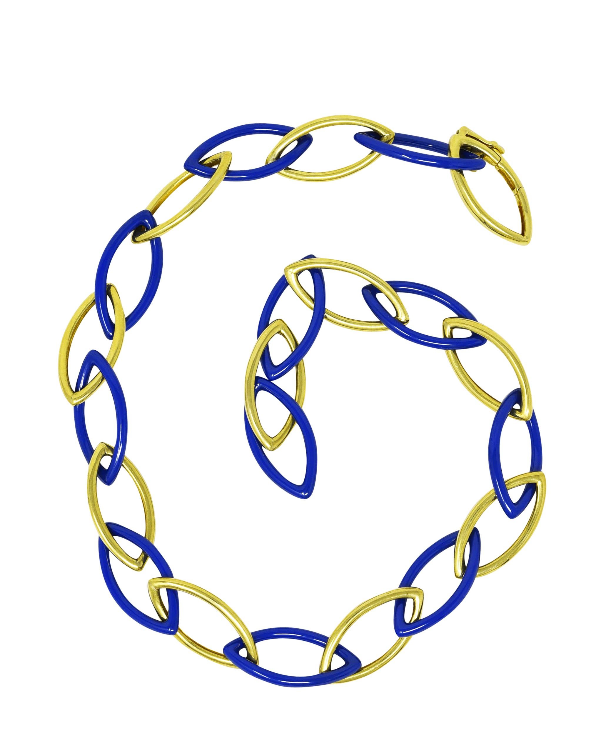 Necklace is designed as alternating blue ceramic and gold marquise shaped links. Ceramic links are deeply saturated ultramarine blue with a gloss finish. Featuring high polished gold finish. Completed by hidden clasp closure with figure eight