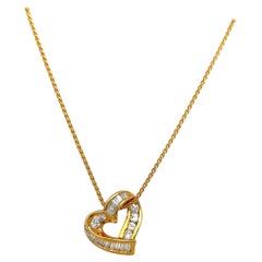 Charles Krypell, oro giallo 18 KT, 1,04 carati. Ciondolo con cuore di diamante