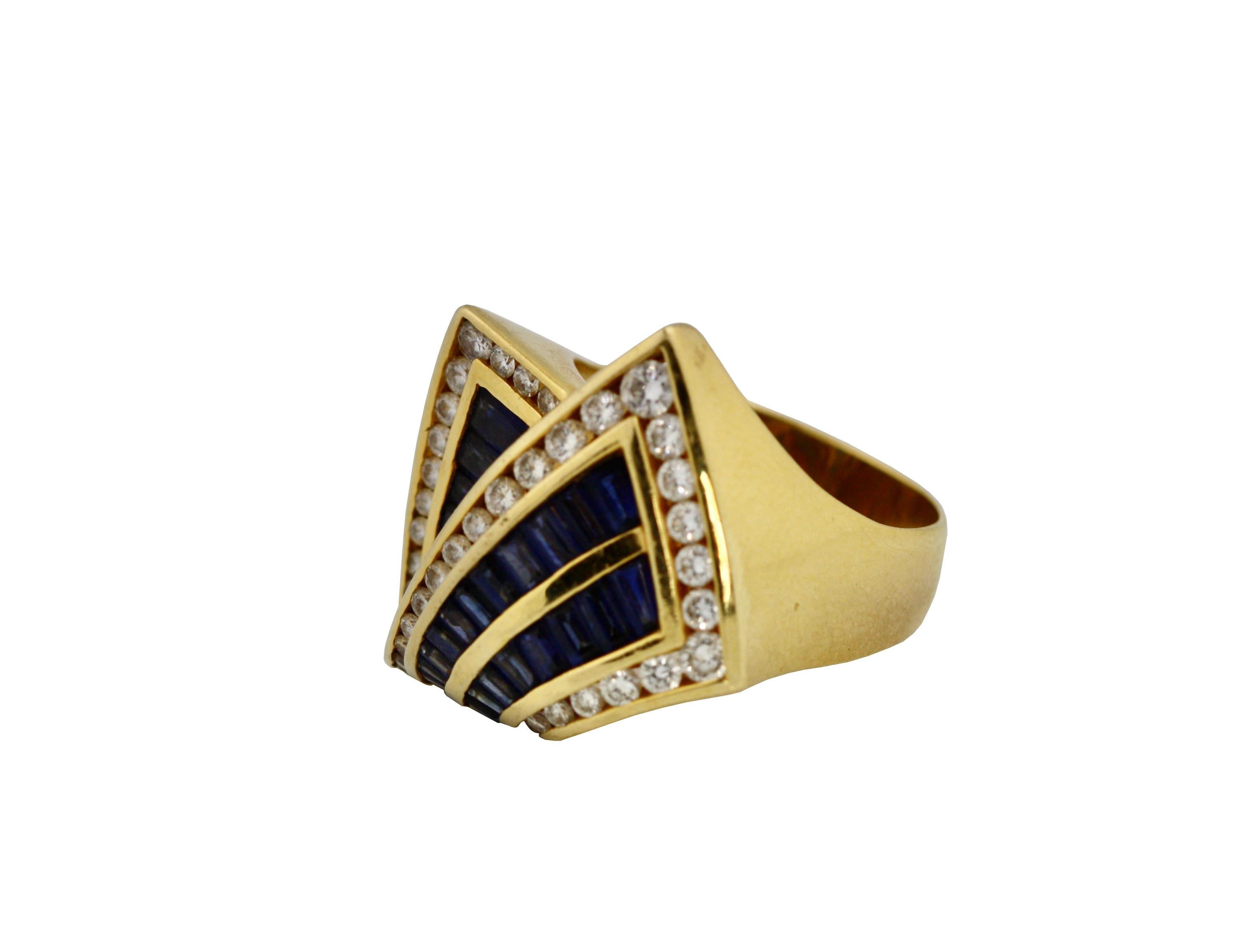 Charles Krypell
18K Gold, Sapphire and Diamond Ring
41 diamonds approx .70 cts,
13 grams (gross) , size 8

