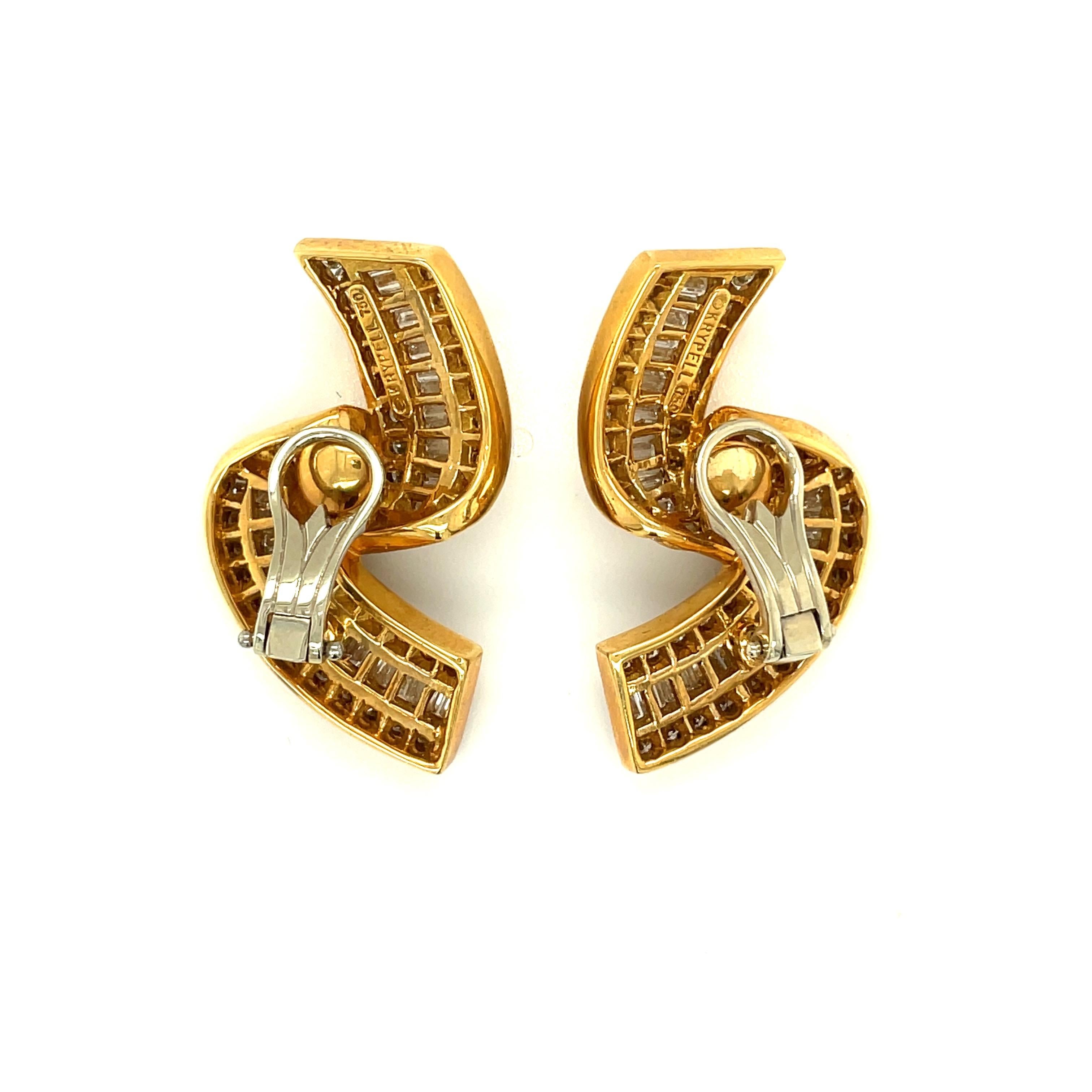 Charles Krypell Jewelry is a New York Based fine jewelry brand that became internationally known for its exquisite use of color, novel designs, and outstanding craftsmanship. 
Set in 18 Karat Yellow Gold, these earrings are designed as a free