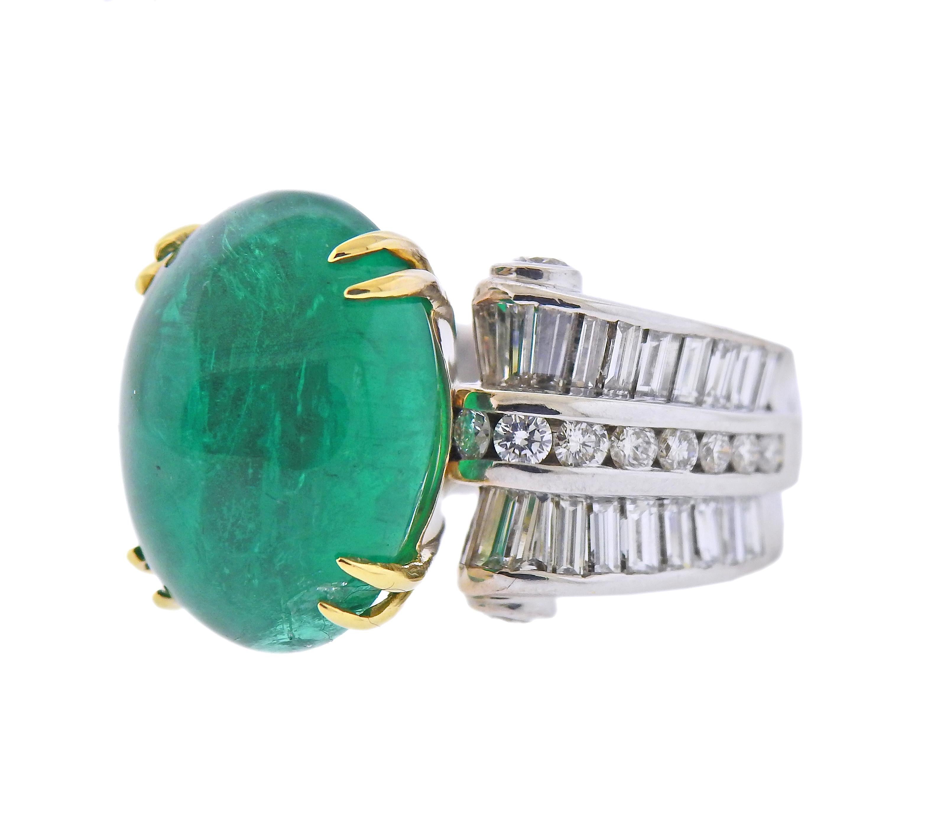 18k gold ring by Charles Krypell, with center approx. 20ct emerald cabochon (has chip under one prong) , measuring 17.1 x 13.4 x 9.8mm, surrounded with approx. 1.50ctw in diamonds. Ring size - 6.5, ring top is 17mm wide. Marked: Krypell 750. Weight