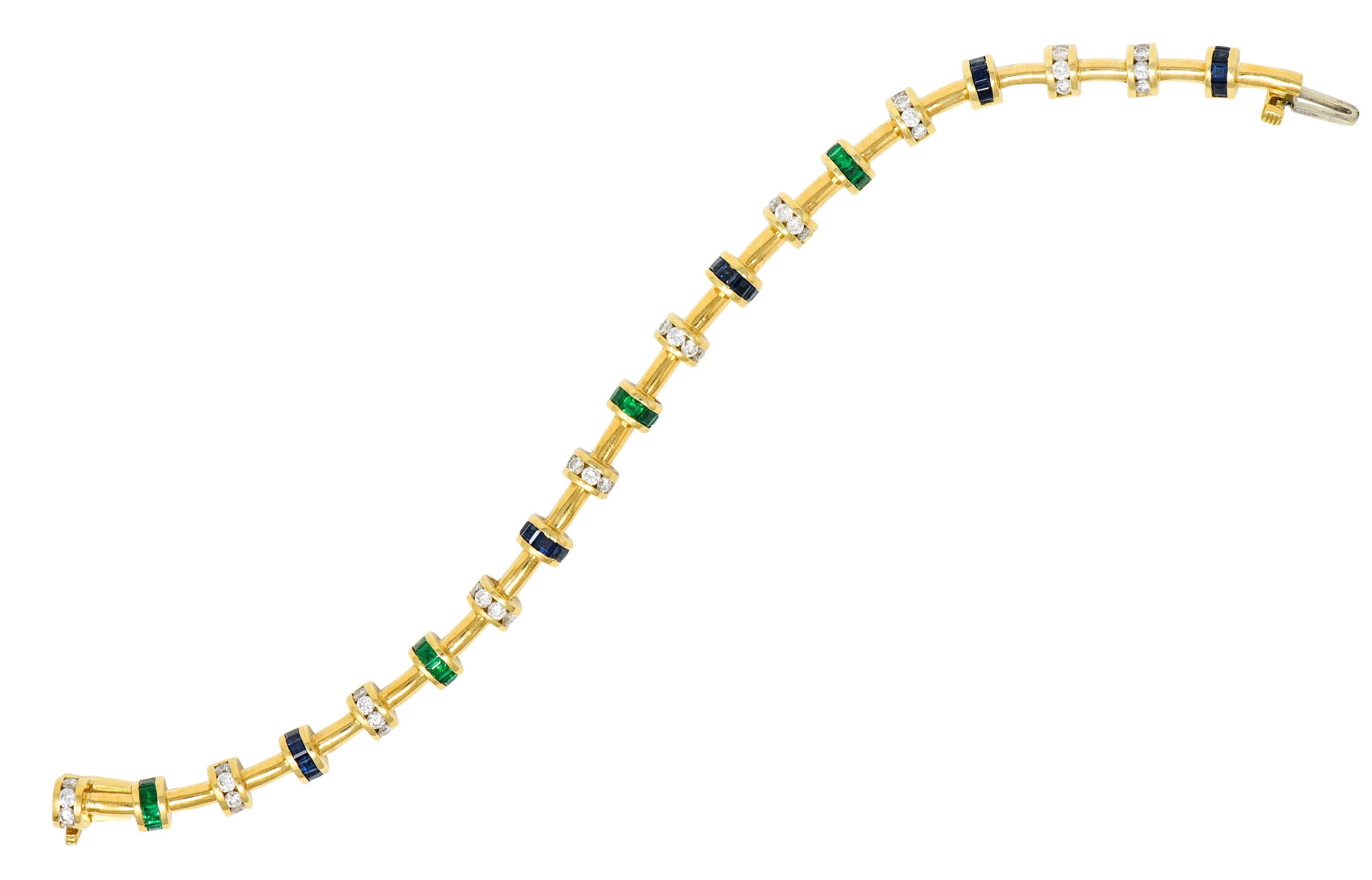 Bracelet is comprised of smooth bar links alternating with gemmed barrel links

Featuring round brilliant cut diamonds weighing in total approximately 1.50 - G/H color with VS clarity

Square cut emeralds weighing in total approximately 1.50 carat -