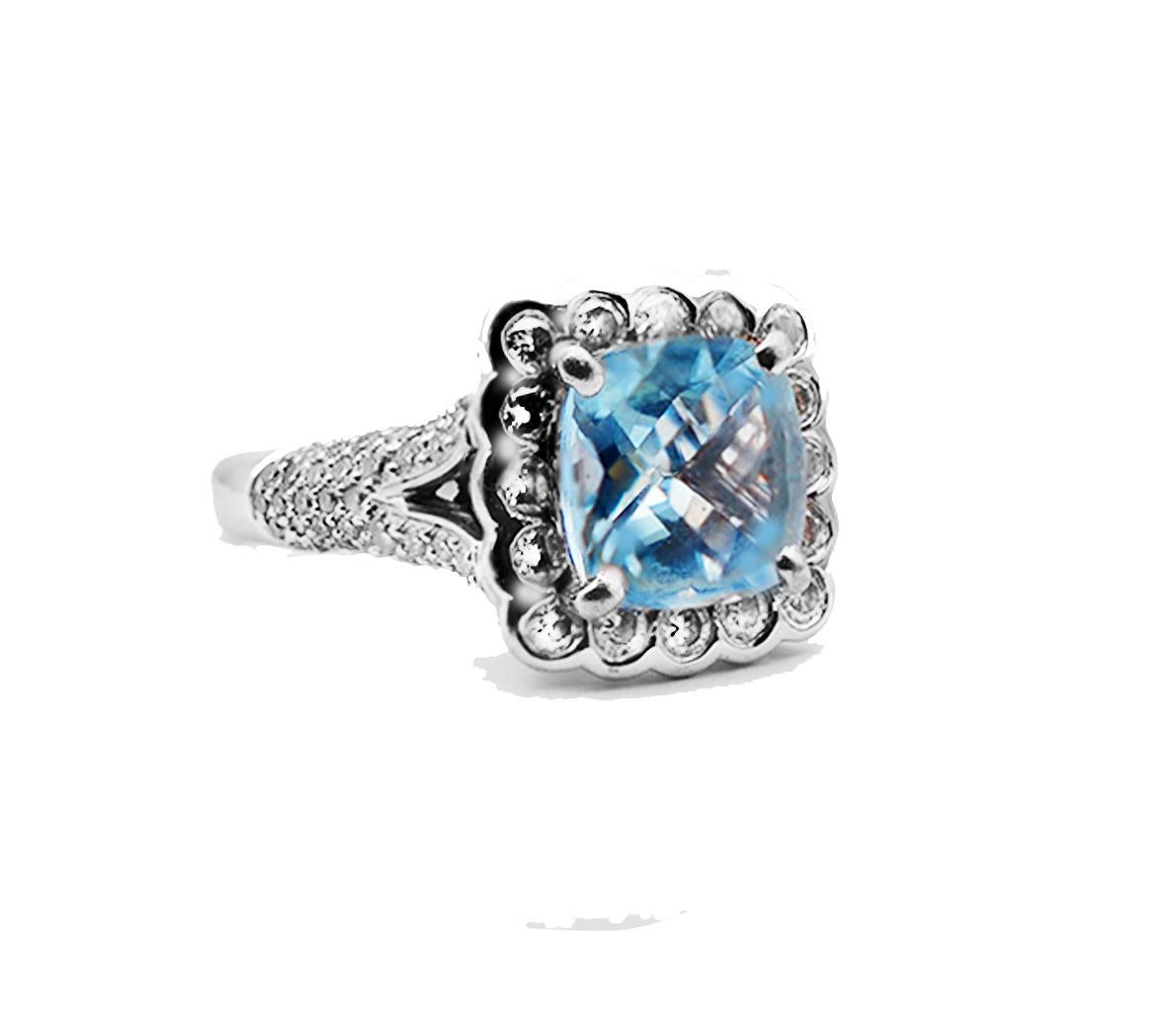 Charles Krypell designer of this beautiful tapestry, cushion-cut Aquamarine blue stone sits in a pave Diamond ring. The face of the halo measures 14mm 

Center, Aquamarine tapestry is 2.35 carats estimated weight and is measuring 9.07 x 9.17 x 4.50