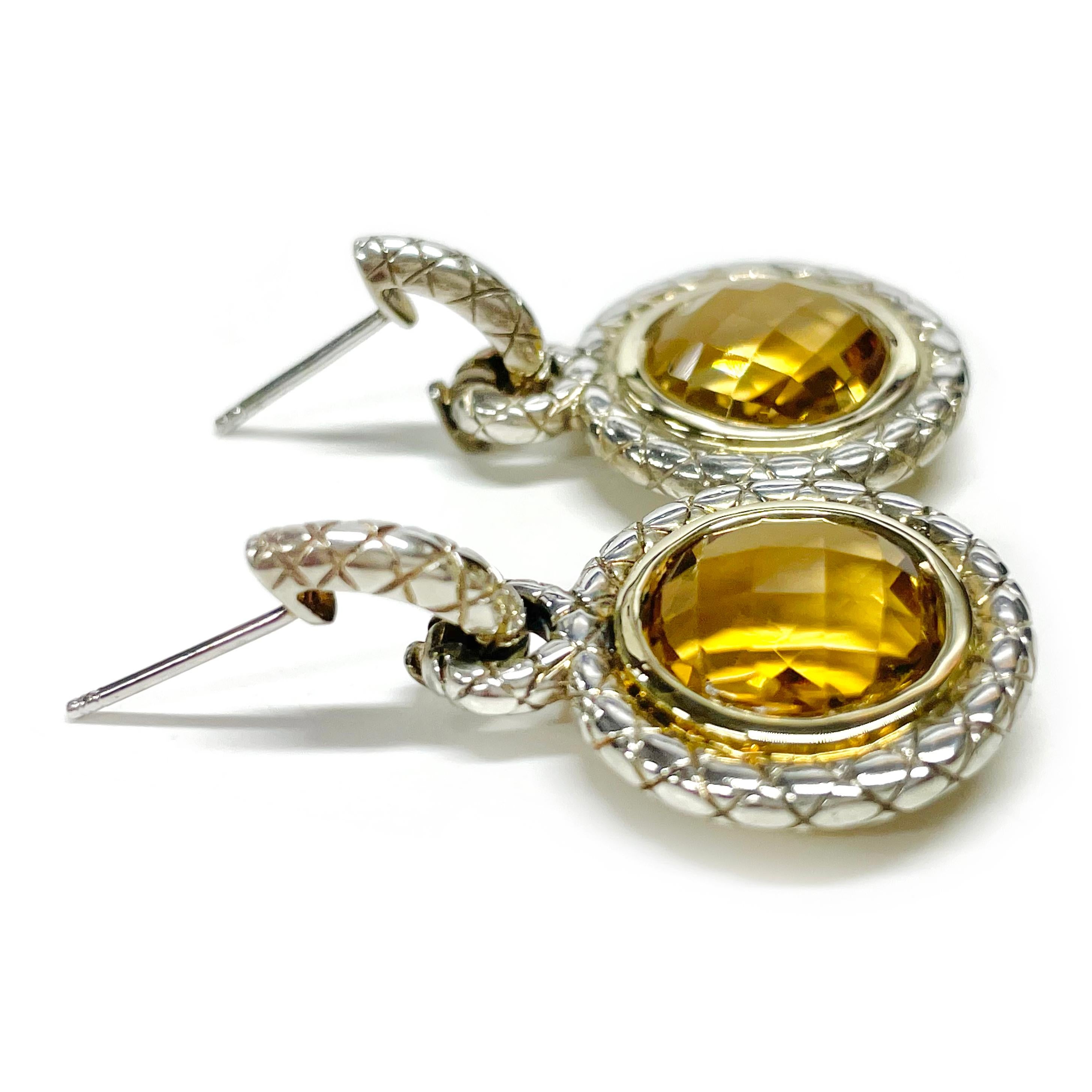 Charles Krypell Two-Tone 14 Karat Yellow Gold and Silver Dangle Citrine Earrings. The Citrine stones have a total carat weight of 11.96ct. Checkerboard-cut round Citrine stones set in a 14 karat gold bezel and a silver textured surround. These
