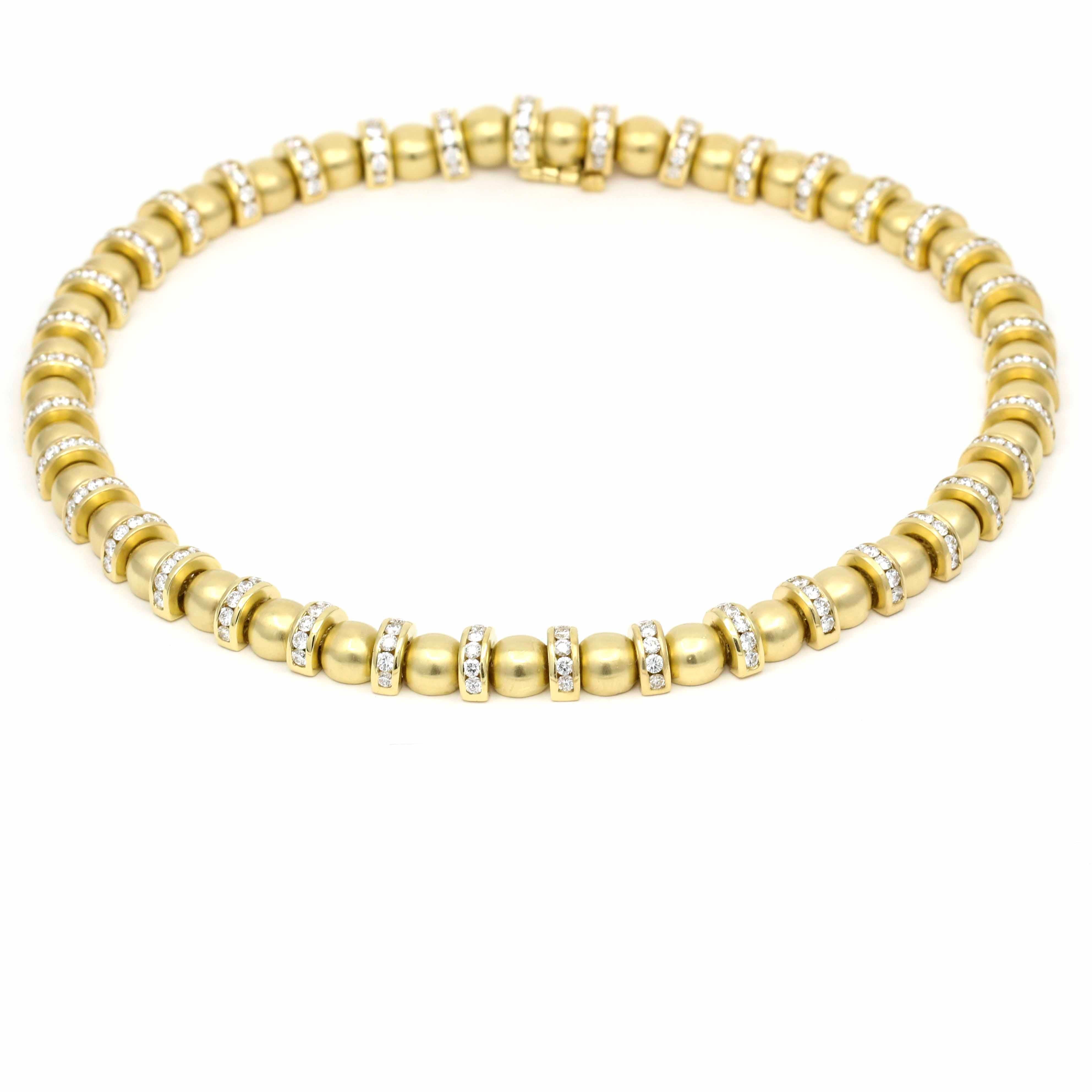 A statement necklace by Charles Krypell crafted in 18k yellow gold with diamonds and a seamless slide clasp with safety. Bold yet elegant chain necklace featuring matte finish gold beads with polished gold diamond station spacers. This beautiful