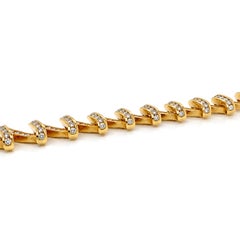 Pulsera de Charles Krypell con diamantes y eslabones tipo cinta de oro amarillo de 18 quilates