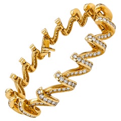 Pulsera de Charles Krypell con diamantes y eslabones tipo cinta de oro amarillo de 18 quilates