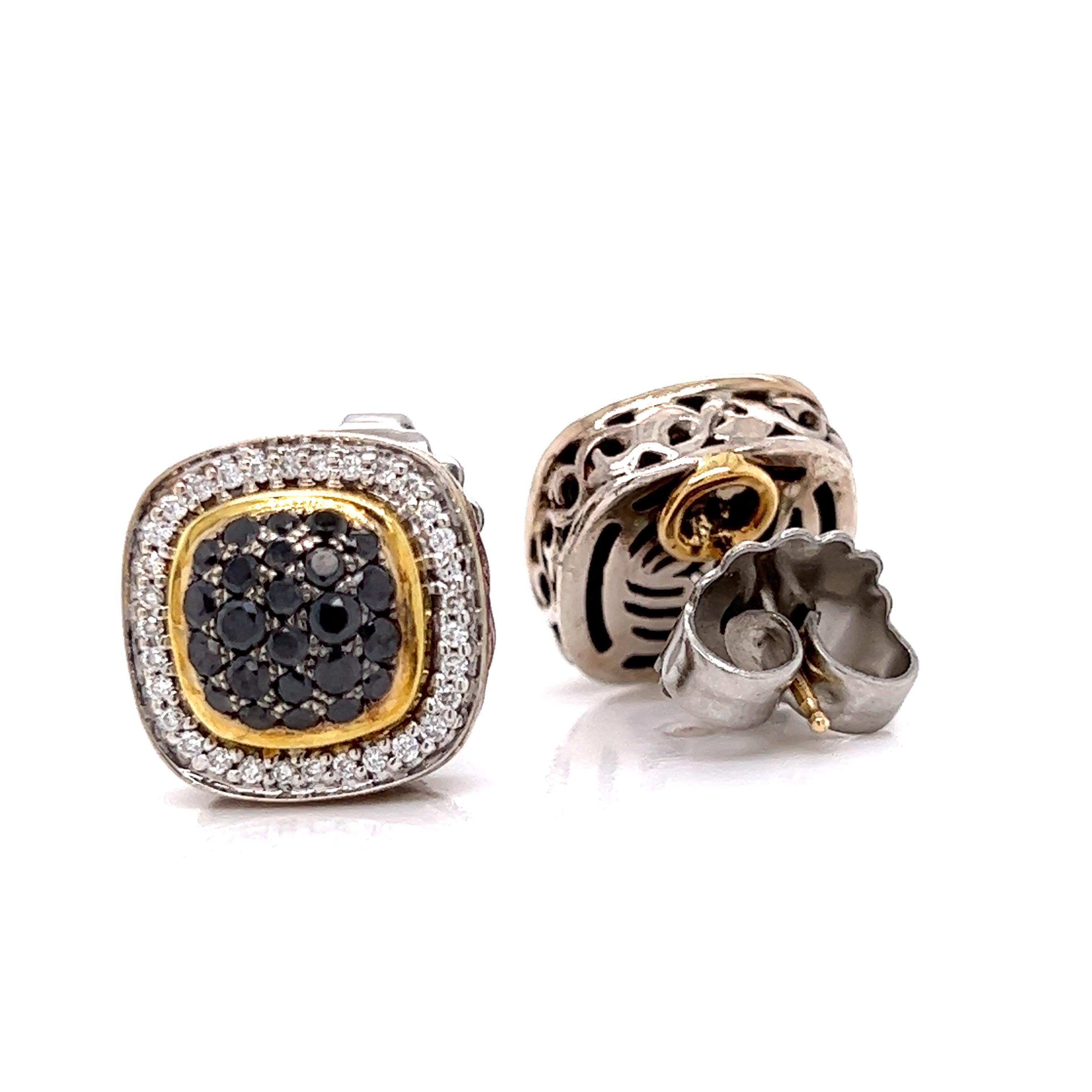 Stunning Charles Krypell estate earrings.  Classic and contrasting with approximately 1.0 ctw black sapphire in the center and approximately 1.0 ctw in SI2-I1 clarity, H-I color white diamonds.   Mounted in sterling silver and 18 Kt yellow gold. 