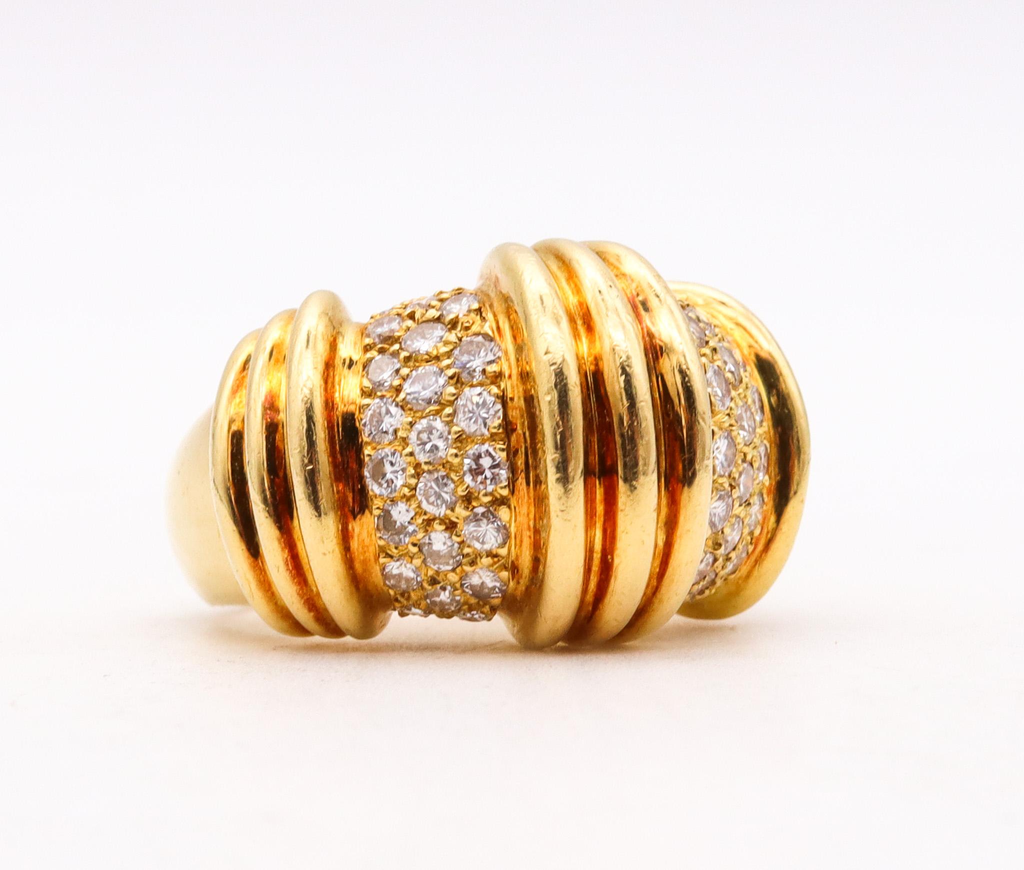 Cocktail ring designed by Charles Krypell.

Beautiful contemporary ring created by the iconic American designer Charles Krypell. This cocktail ring has been crafted with classical fluted patterns in solid yellow gold of 18 karats with high polished
