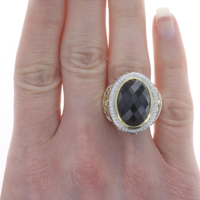 Retail Price: $2650

Size: 9 1/2
Sizing Fee: Up 2 sizes for $50 or Down 2 sizes for $50

Brand: Charles Krypell

Metal Content: Sterling Silver & 18k Yellow Gold

Stone Information
Natural Onyx
Cut: Oval Checkerboard Cabochon & Round
Color: