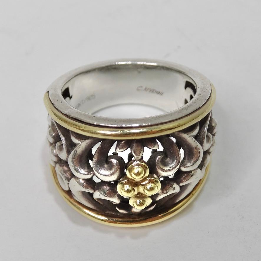 In search of your next every day ring? Look no further as Charles Krypell has you covered! This incredible dome style ring is compromised of intricately engraved sterling silver contrasted by 18K gold.  Look closely and notice the gold motif at the