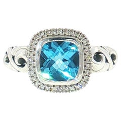 Charles Krypell – Ring aus Sterlingsilber mit blauem Topas und Diamanten im Halo-Design