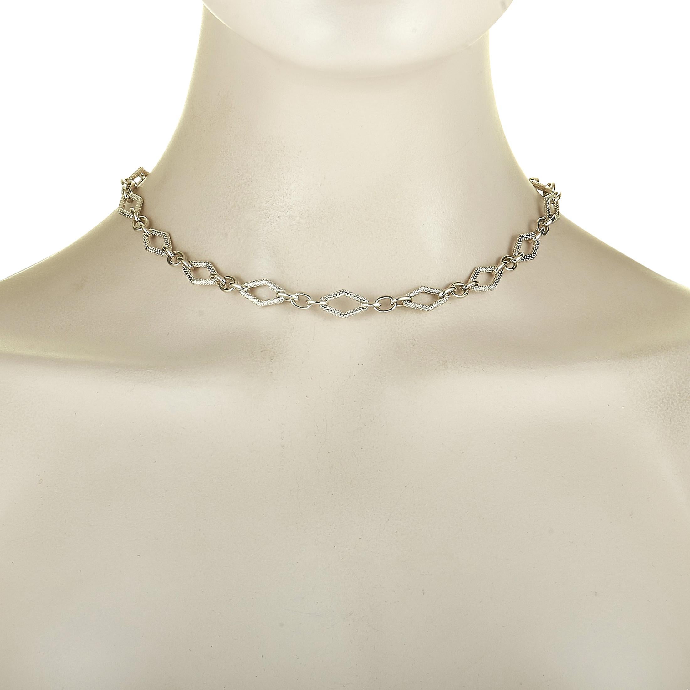 This Charles Krypell necklace is made out of 14K white gold and silver and embellished with a total of 0.10 carats of diamonds. The necklace weighs 37.2 grams and measures 16” in length.

Offered in brand new condition, this jewelry piece includes a