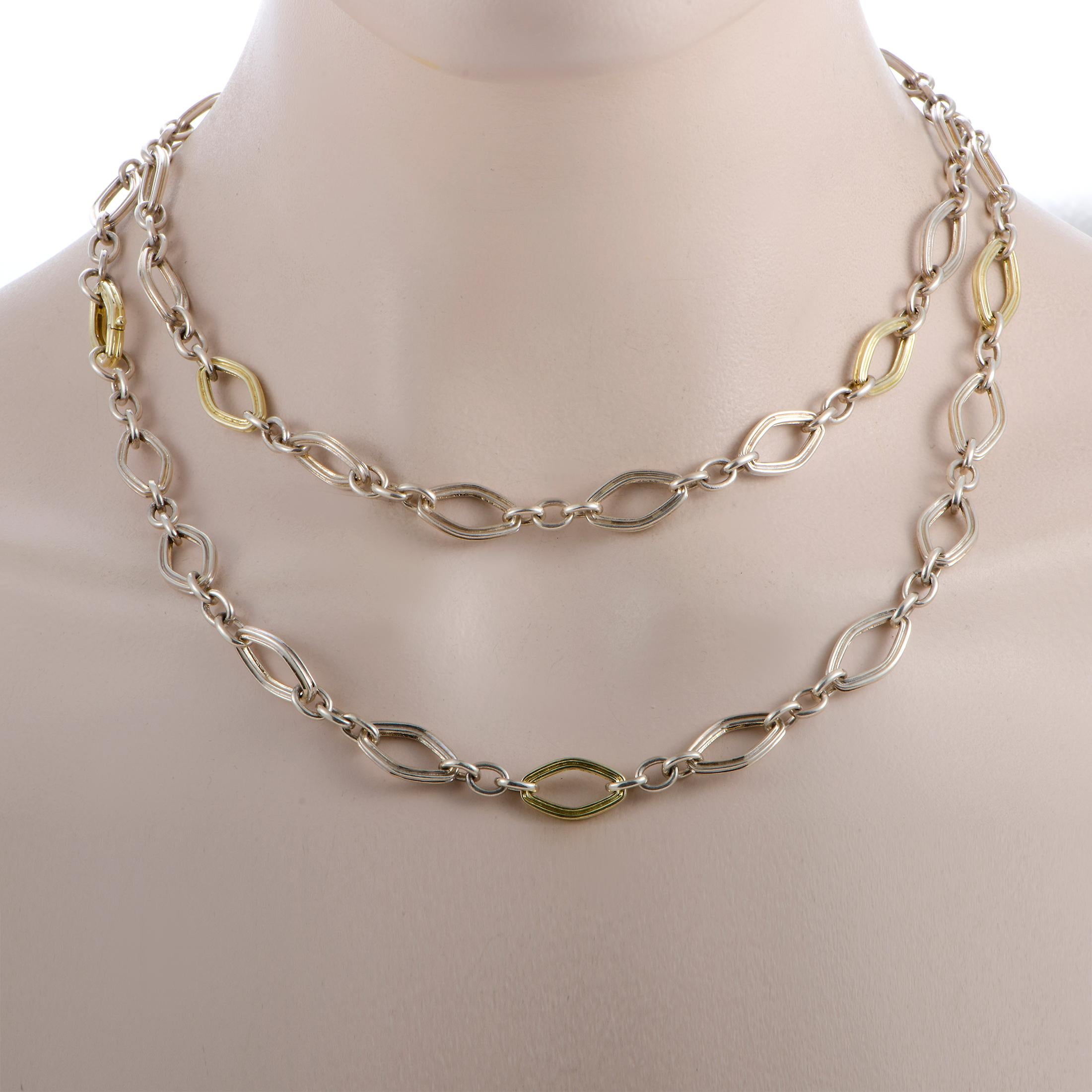 This Charles Krypell necklace is made out of 14K yellow gold and silver and weighs 75 grams, measuring 35” in length.

The necklace is offered in brand new condition and includes a gift box.