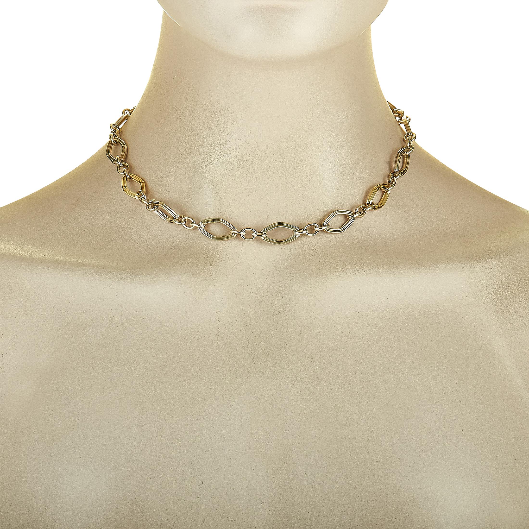 This Charles Krypell necklace is made out of 14K yellow gold and silver and weighs 33.7 grams, measuring 15” in length.

The necklace is offered in brand new condition and includes a gift box.
