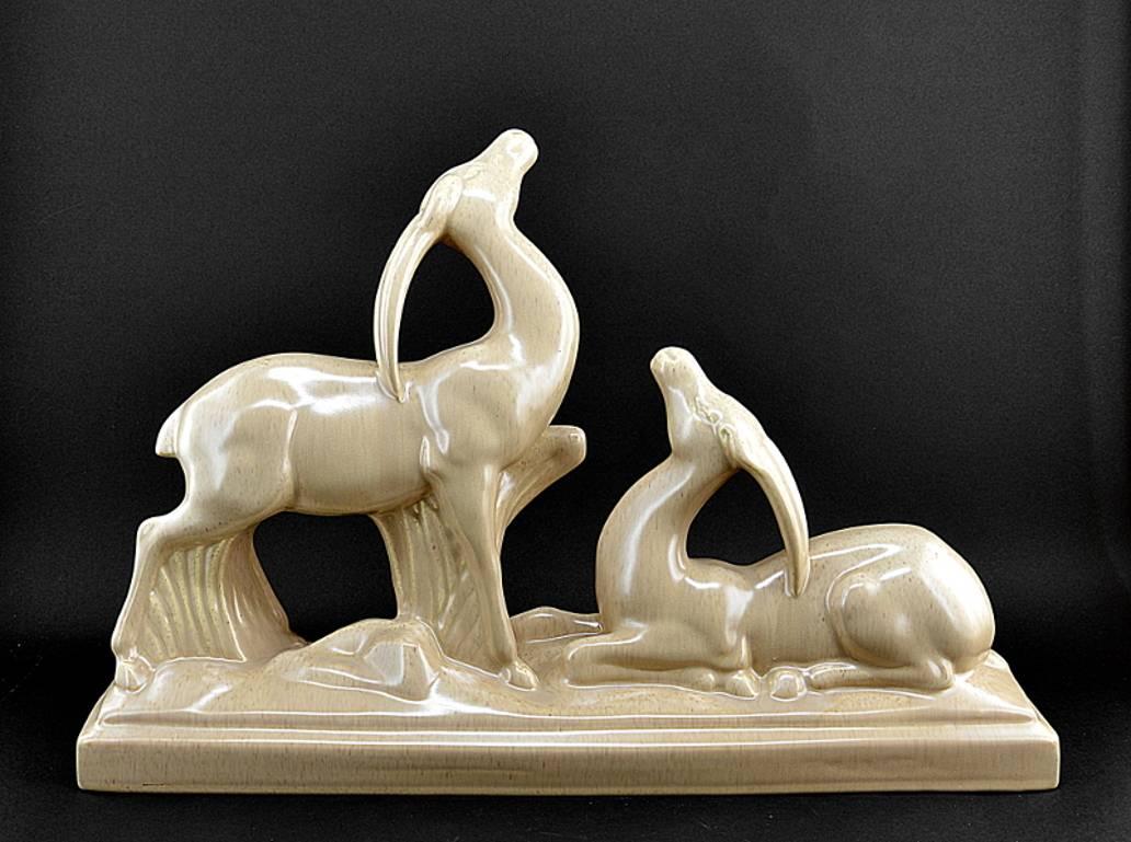 French Art Deco crackle glaze ceramic couple of antelopes by Charles Lemanceau at Sainte-Radegonde's for Le Printemps, circa 1935. Signed 