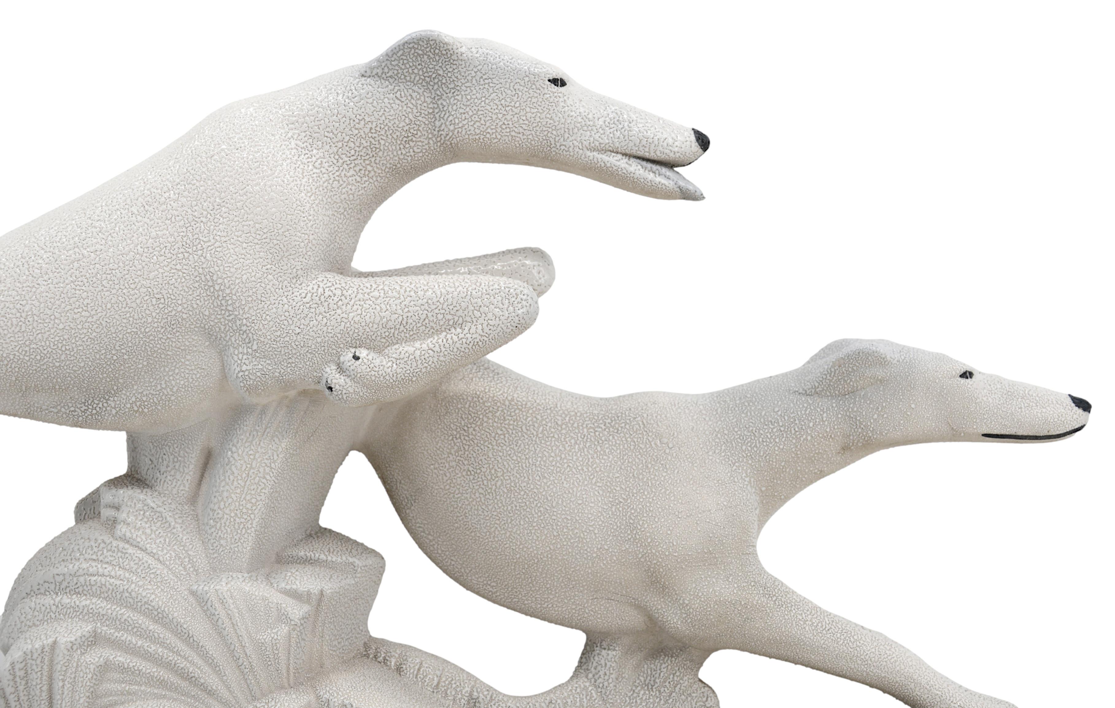 French Art Deco greyhound couple sculpture by Charles Lemanceau at Sainte-Radegonde, France, 1930. Greyhound race. Illustrated in the Sainte-Radegonde catalogue, page #8 (see photo). Width: 21.25
