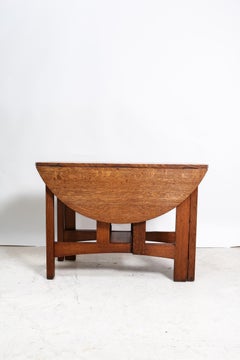 Arts and Crafts Oak Centre table by Charles Limbert