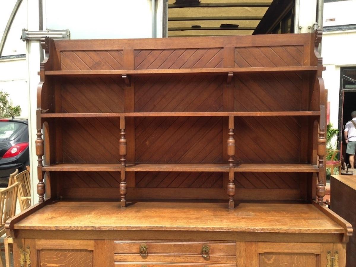 English Charles Locke Eastlake Arts & Crafts Oak Dresser with Shelves and Carved Florets For Sale