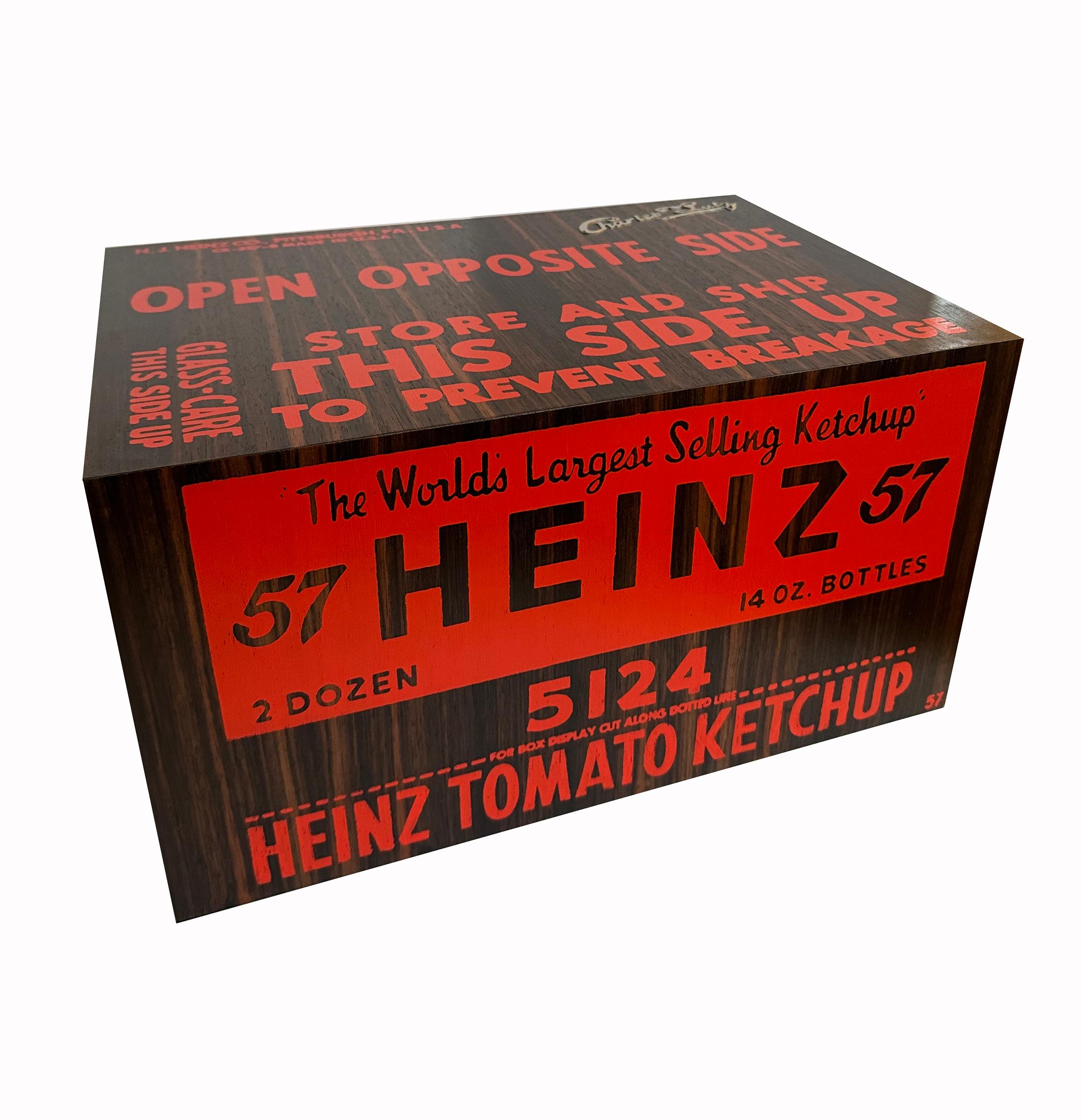 The sculpture Heinz Box (Art Deco) by Charles Lutz is an innovative reimagining of the iconic Heinz box and is a striking fusion of contemporary Pop Art and Art Deco elegance. Crafted with a rich Macassar ebony veneer, the box exudes a deep,