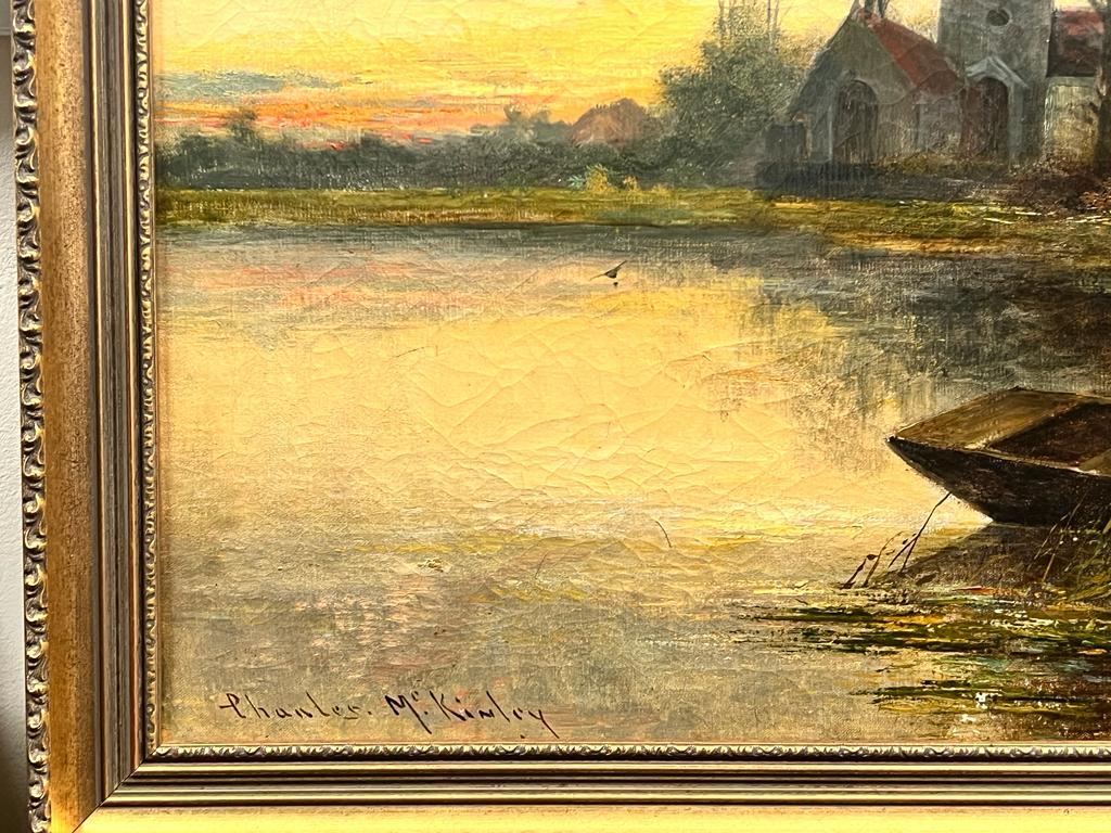 Antique English Signed Oil Sunset River Landscape Boat Old Church & Buildings - Victorian Painting by Charles M.C Kinley