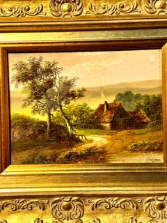 19th century English landscape setting with cottage by a pond