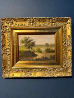 19th century English landscape setting with cottage by a pond