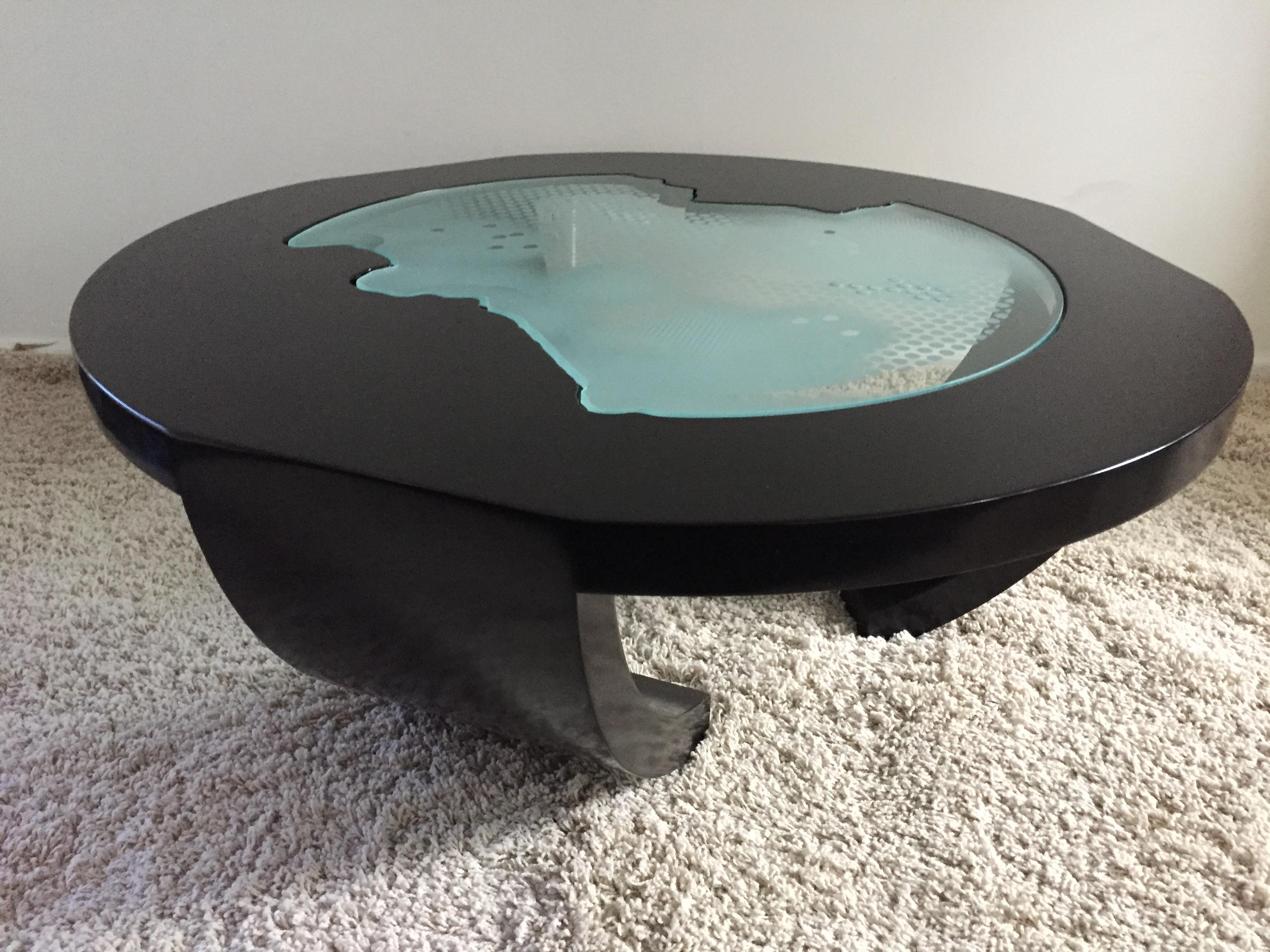 Charles Pace custom black lacquer and acid etched and engraved glass top cocktail or coffee table, circular design with three inverted curved legs, taper flat are at each leg.