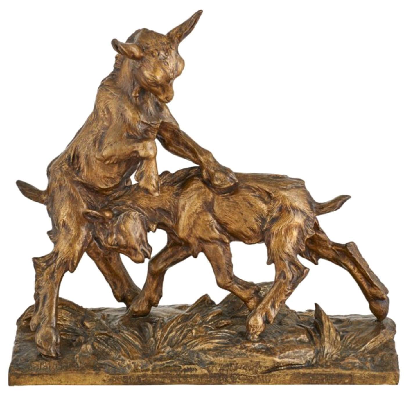 A large Charles Paillet French (1871-1937) bronze of two playful goats "Medaille D'or"

Here we have a fun and whimsical statue sculpture of two young goats playing in the grass. One is ramming his head while the other stands on his hind legs to get