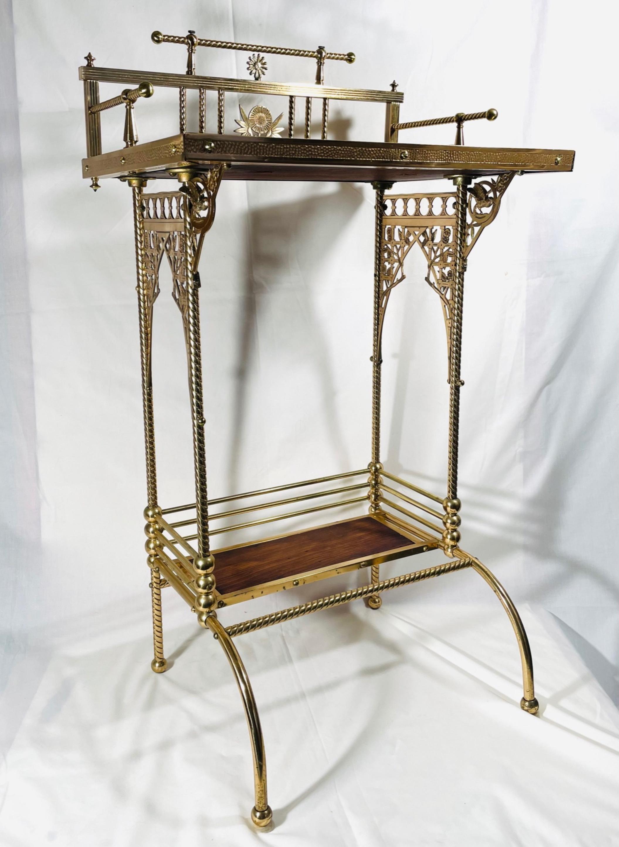 Charles Parker aesthetic movement brass telephone table stand, ca. 1880

This rare, one of a few known, brass table by the Charles Parker Company is an exceptional example of the American Aesthetic Movement. Elegant brass frame is designed in bent