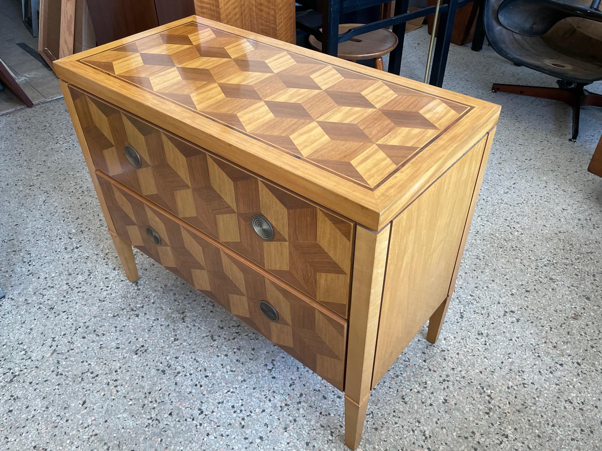 An unusual parquetry chest with a geometric design by Charles Pfister for Baker Furniture ca' 1980's. Two drawers, 9