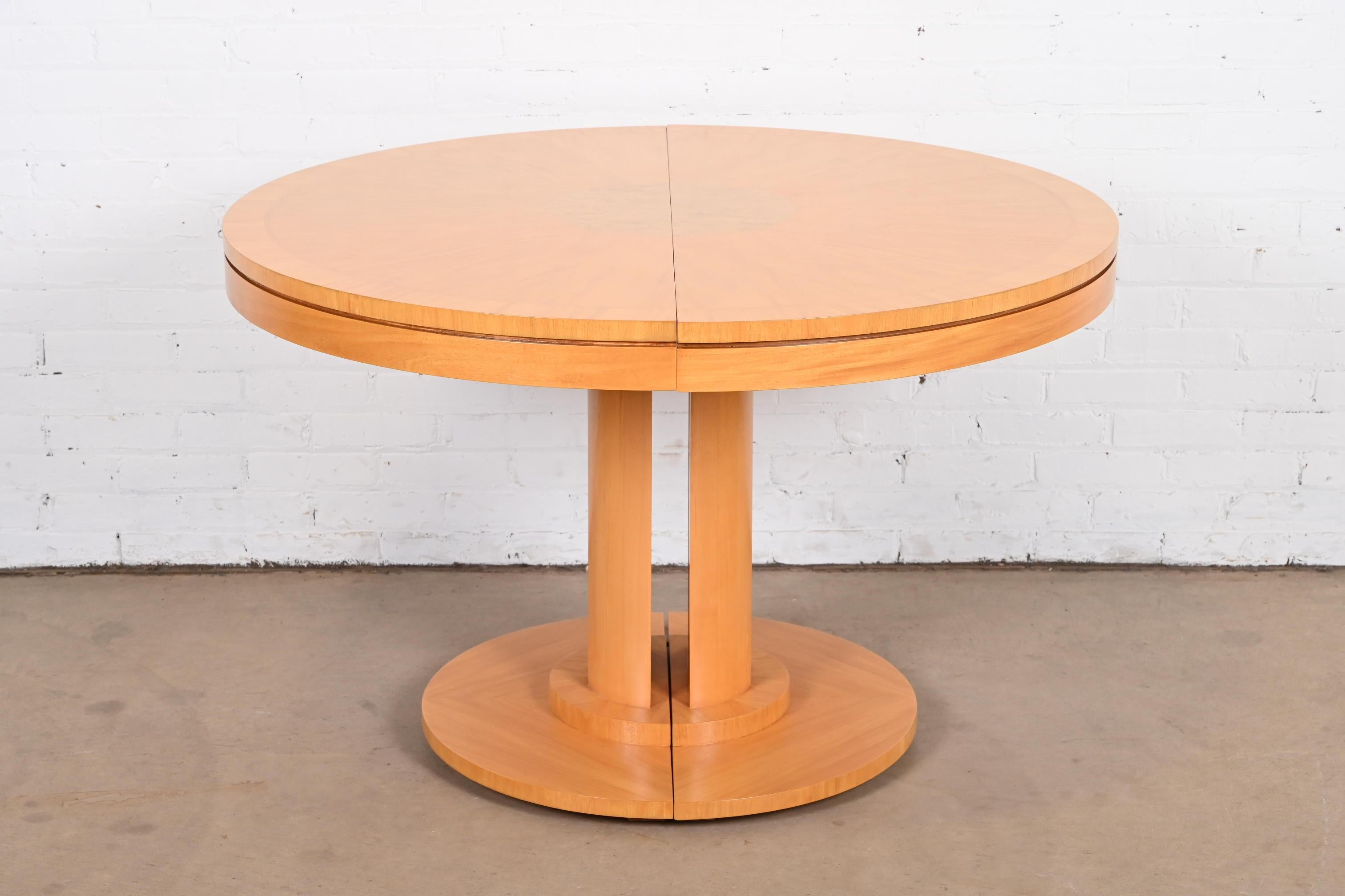 A rare and exceptional modern Art Deco pedestal dining table, game table, or center table

By Charles Pfister for Baker Furniture

USA, 1980s

Gorgeous primavera wood, with burl wood inlay on top.

Measures: 46